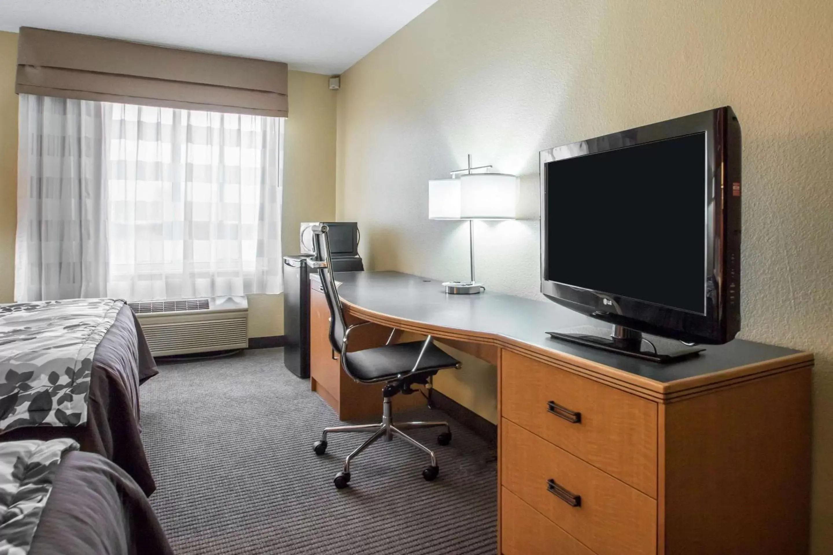 Photo of the whole room, TV/Entertainment Center in Sleep Inn & Suites Sheboygan I-43