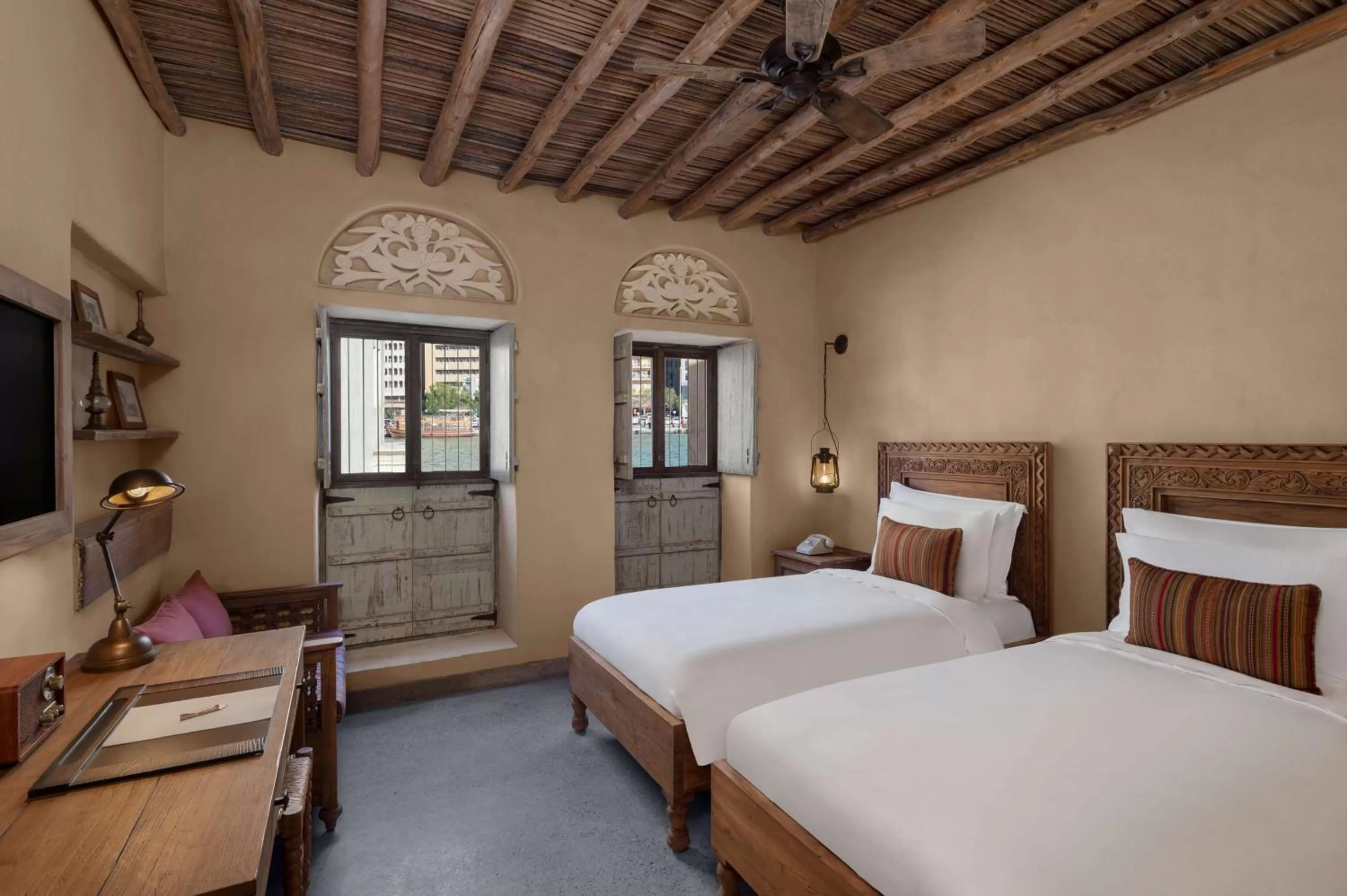 Bed in Al Seef Heritage Hotel Dubai, Curio Collection by Hilton