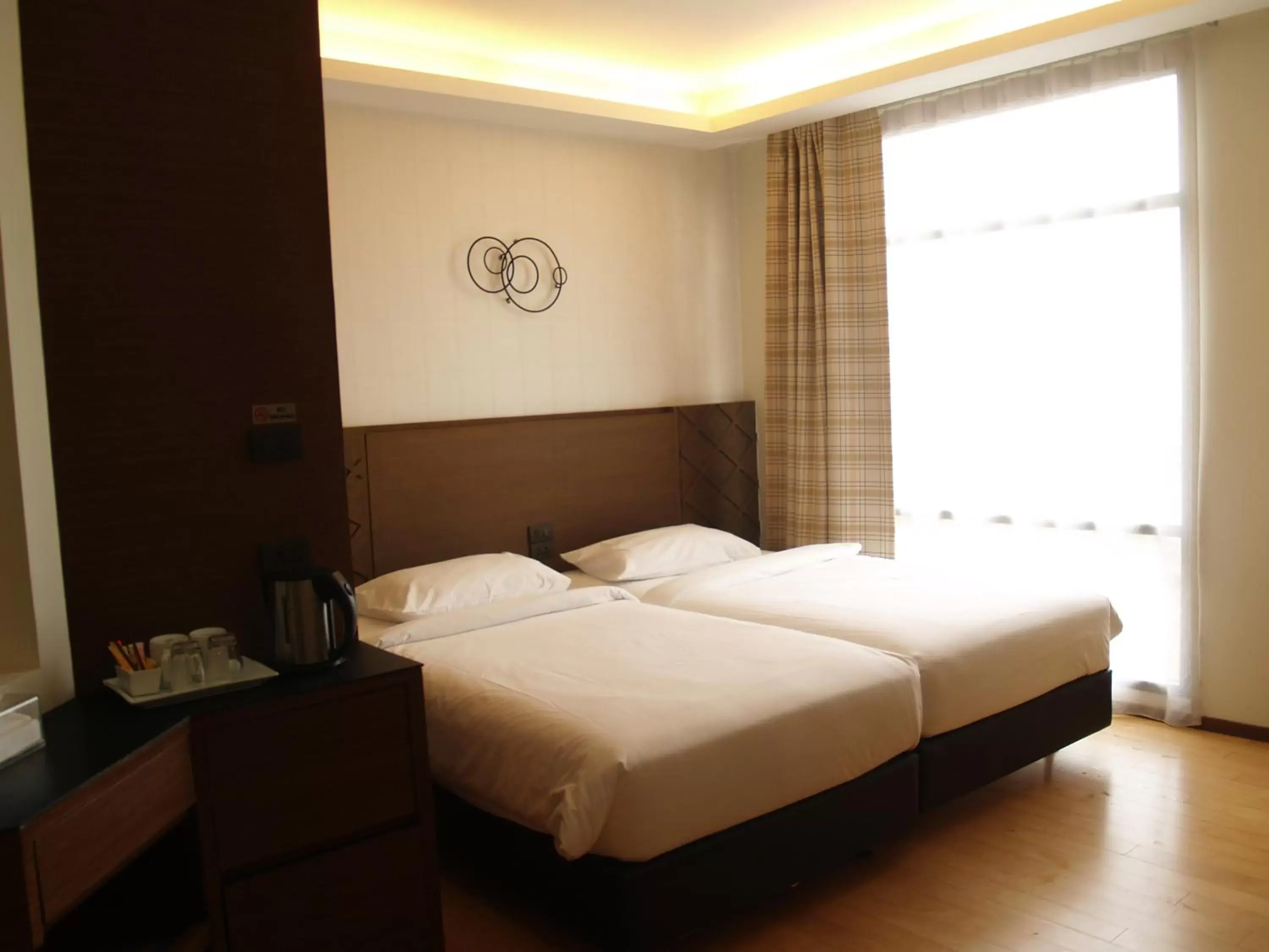 Bed in Marvin Suites Hotel