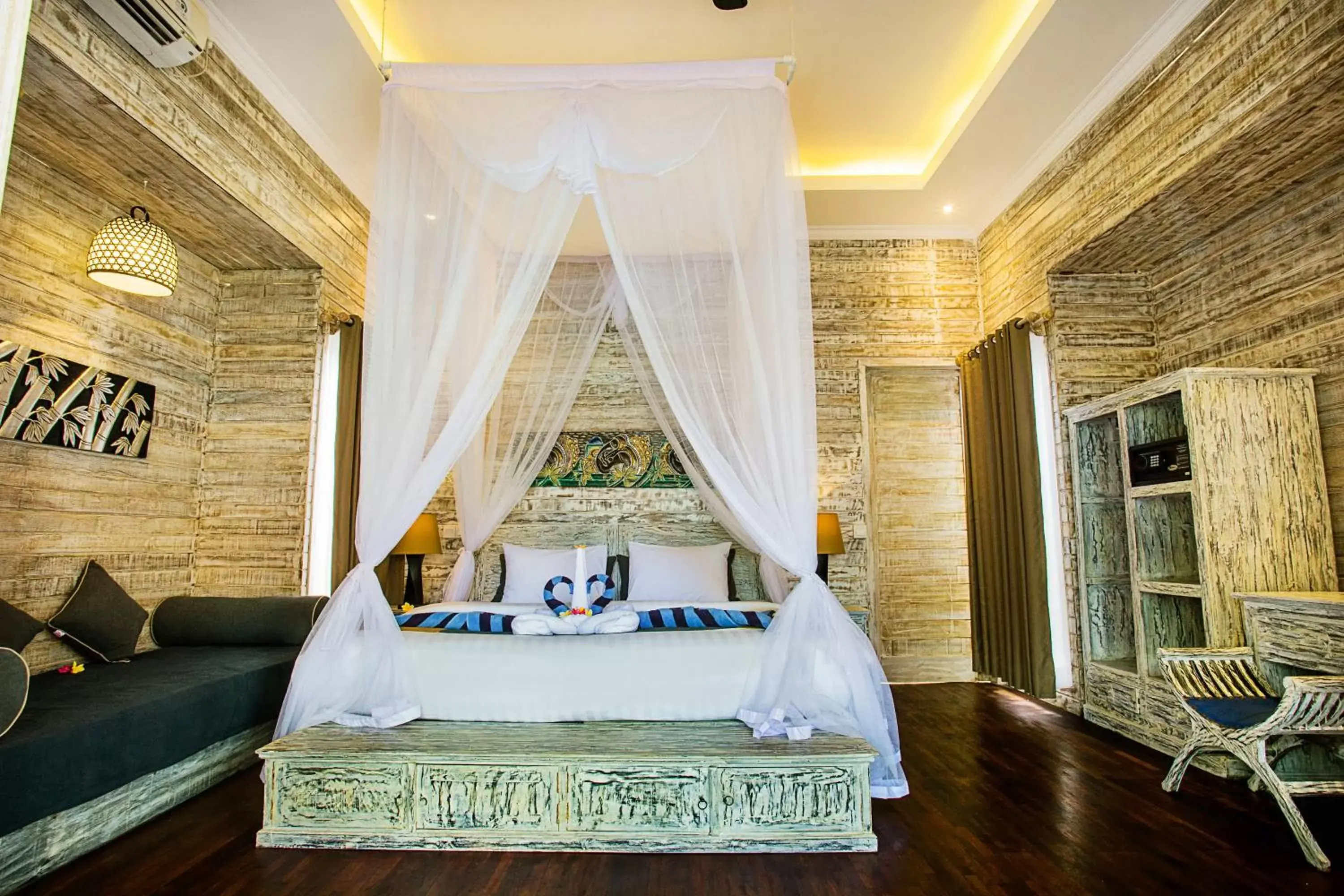 Bed in The Palm Grove Villas