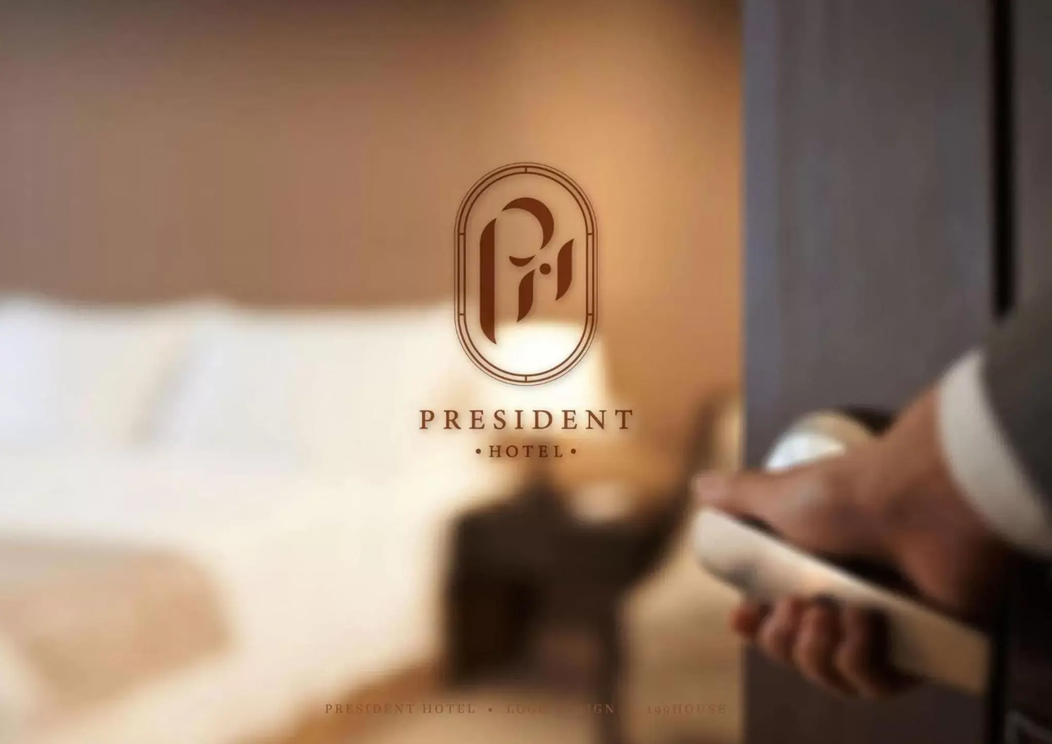 Property logo or sign in President Hotel Udonthani