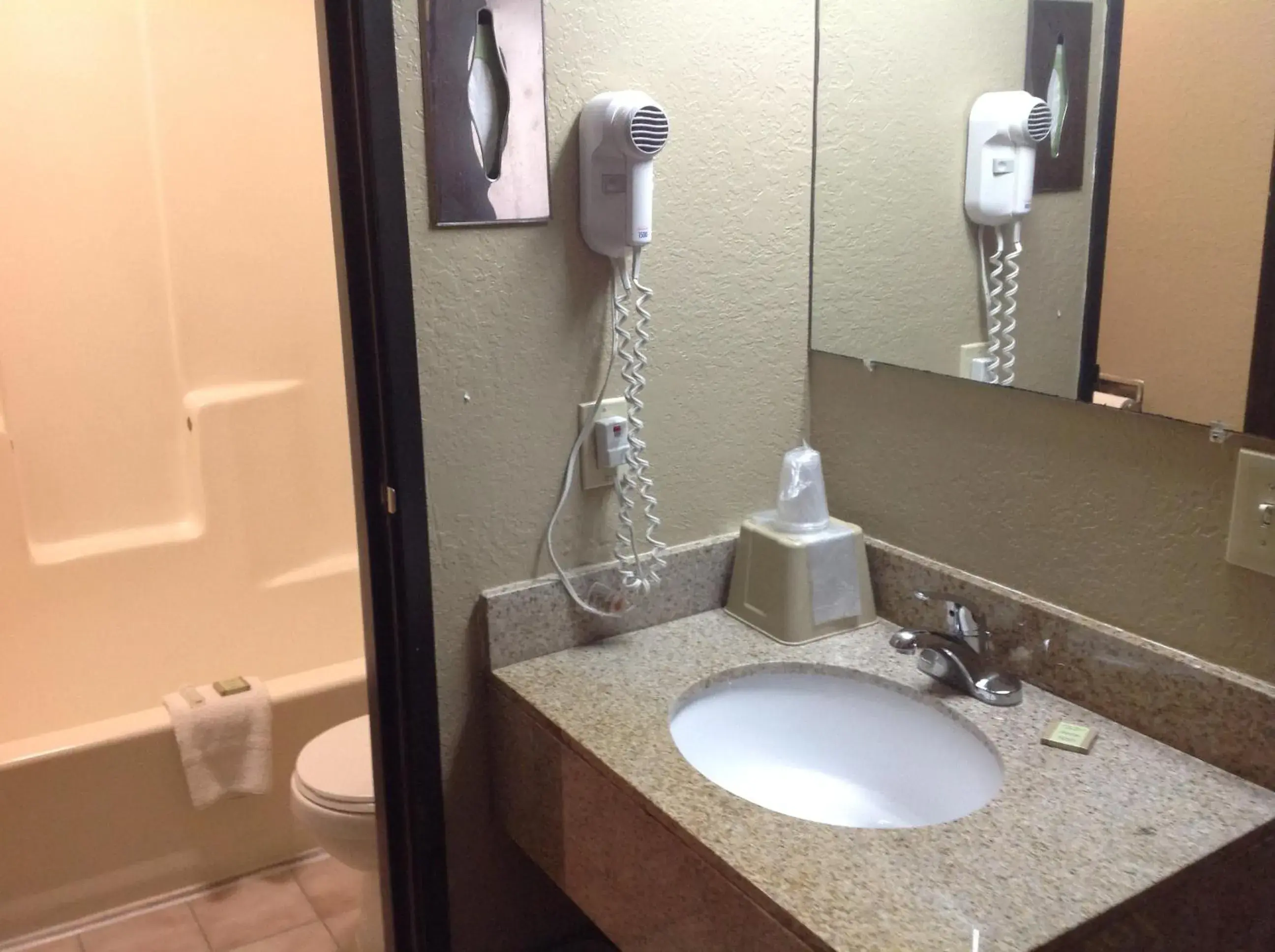 Bathroom in Super 8 by Wyndham Sherman