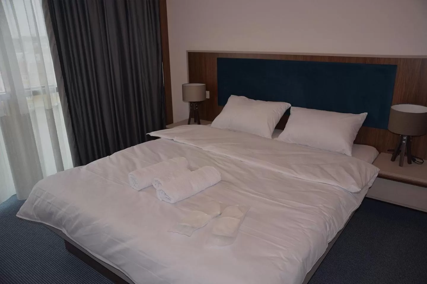 Bed in TEVETOGLU HOTEL