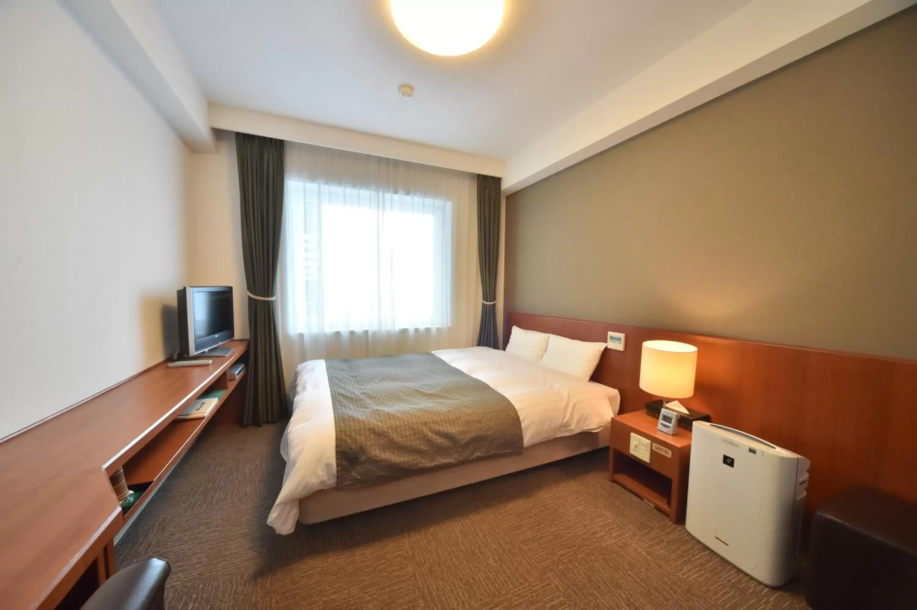 Photo of the whole room, Bed in Dormy Inn Wakkanai