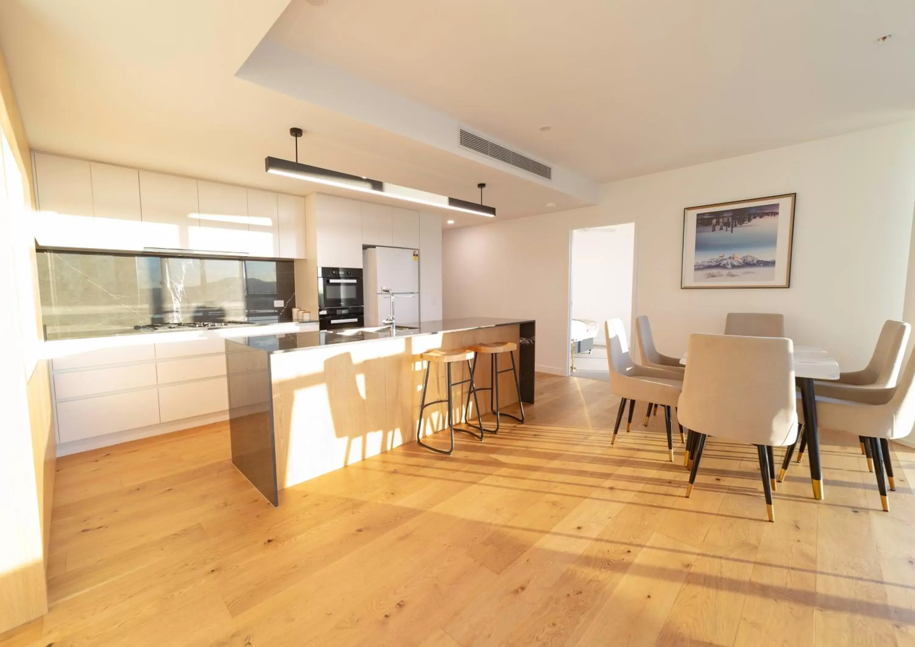 Kitchen or kitchenette, Dining Area in Brisbane One Apartments by CLLIX