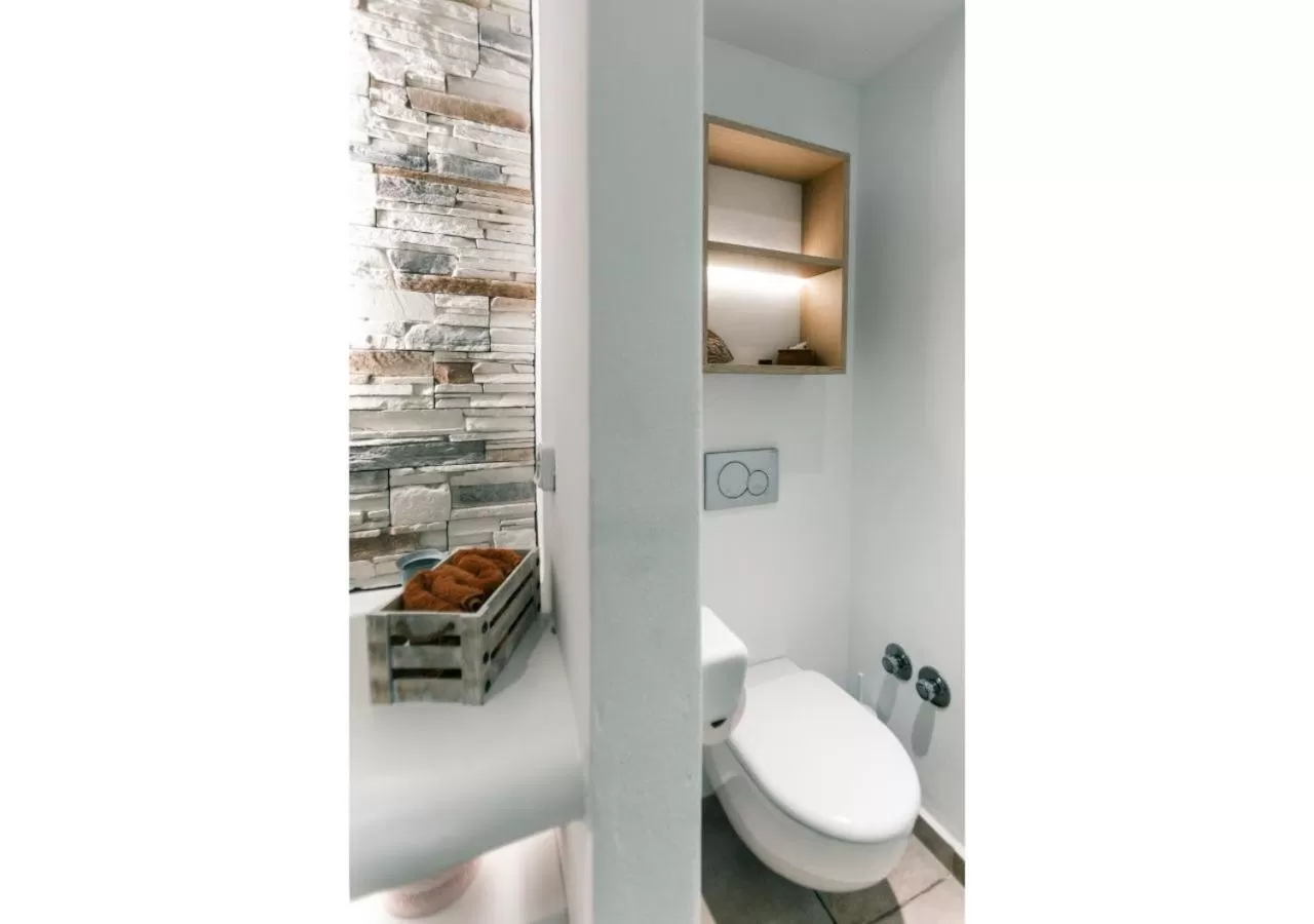 Shower in Arco Naxos Luxury Apartments