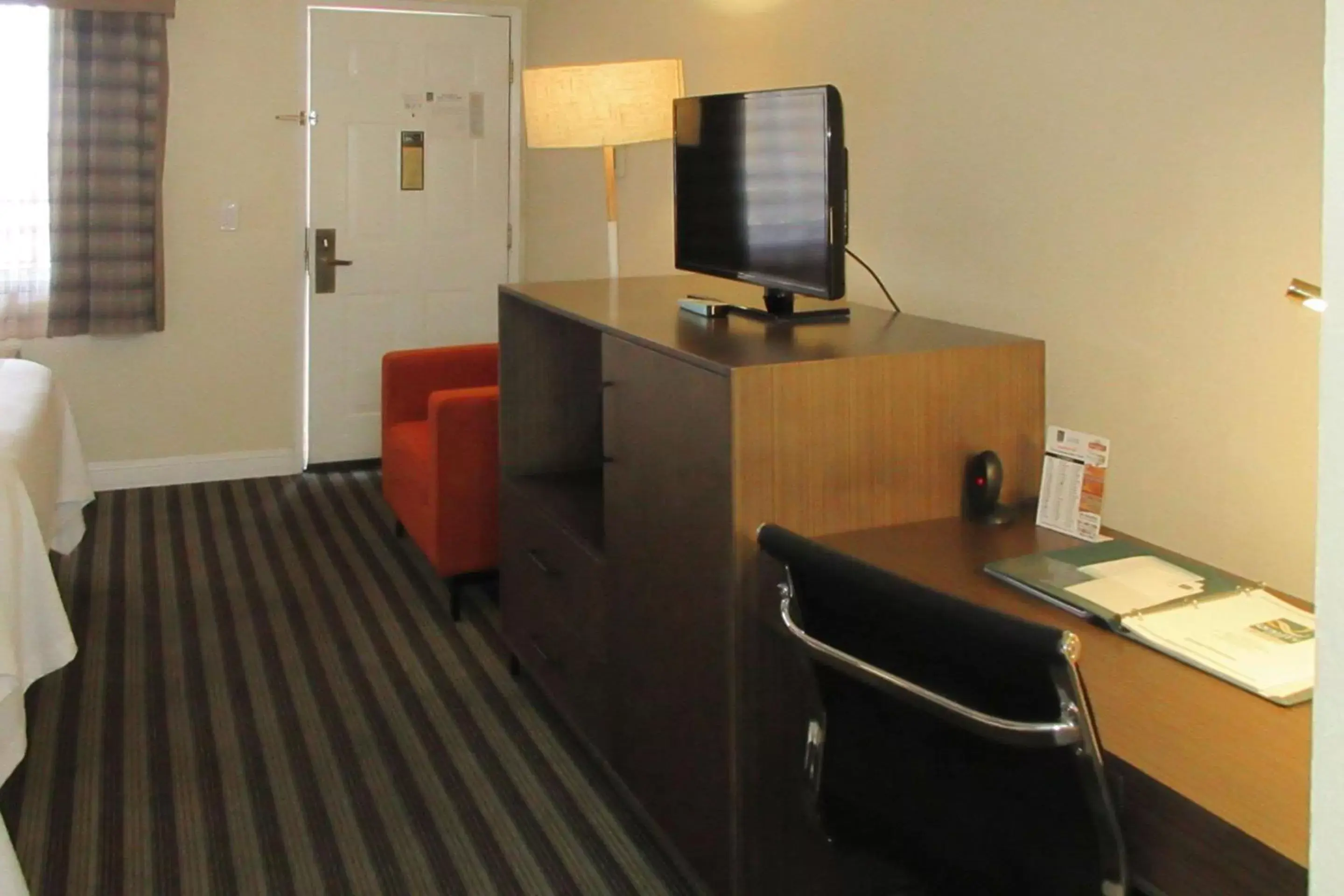 Photo of the whole room, TV/Entertainment Center in Quality Inn Salinas