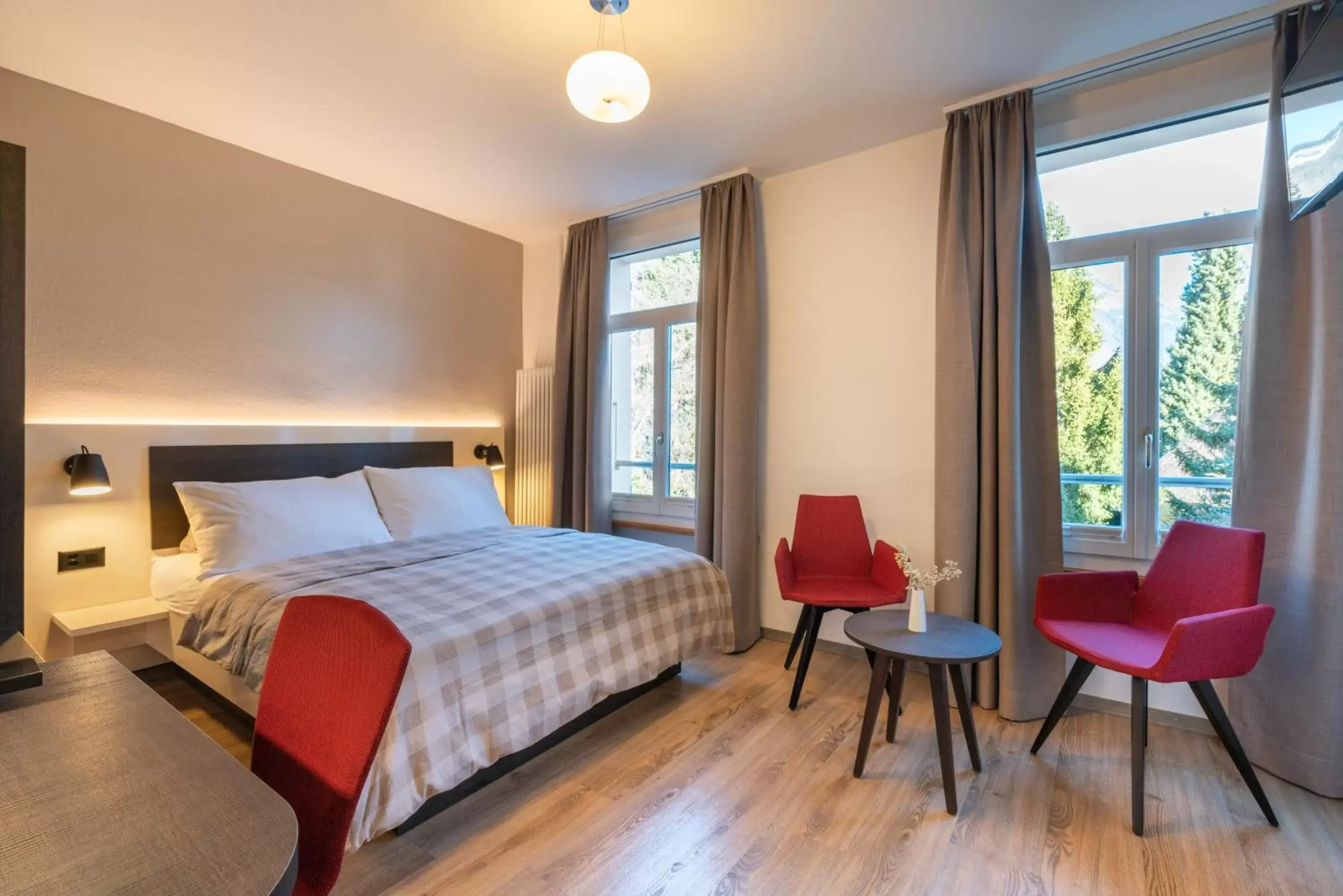 Bed in Hotel Derby Interlaken - Action & Relax Hub