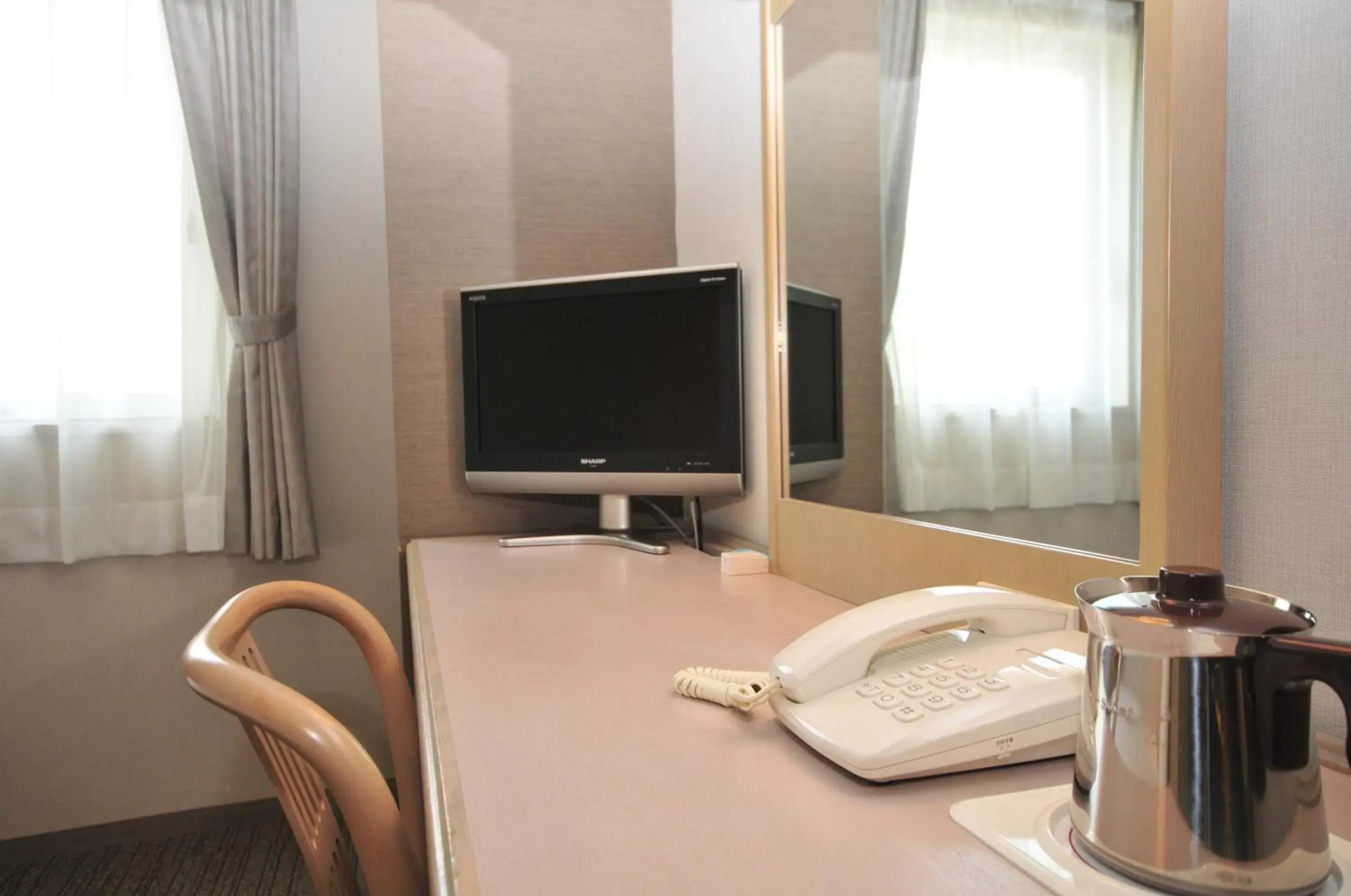 Bedroom, TV/Entertainment Center in Hotel Premium Green Plus