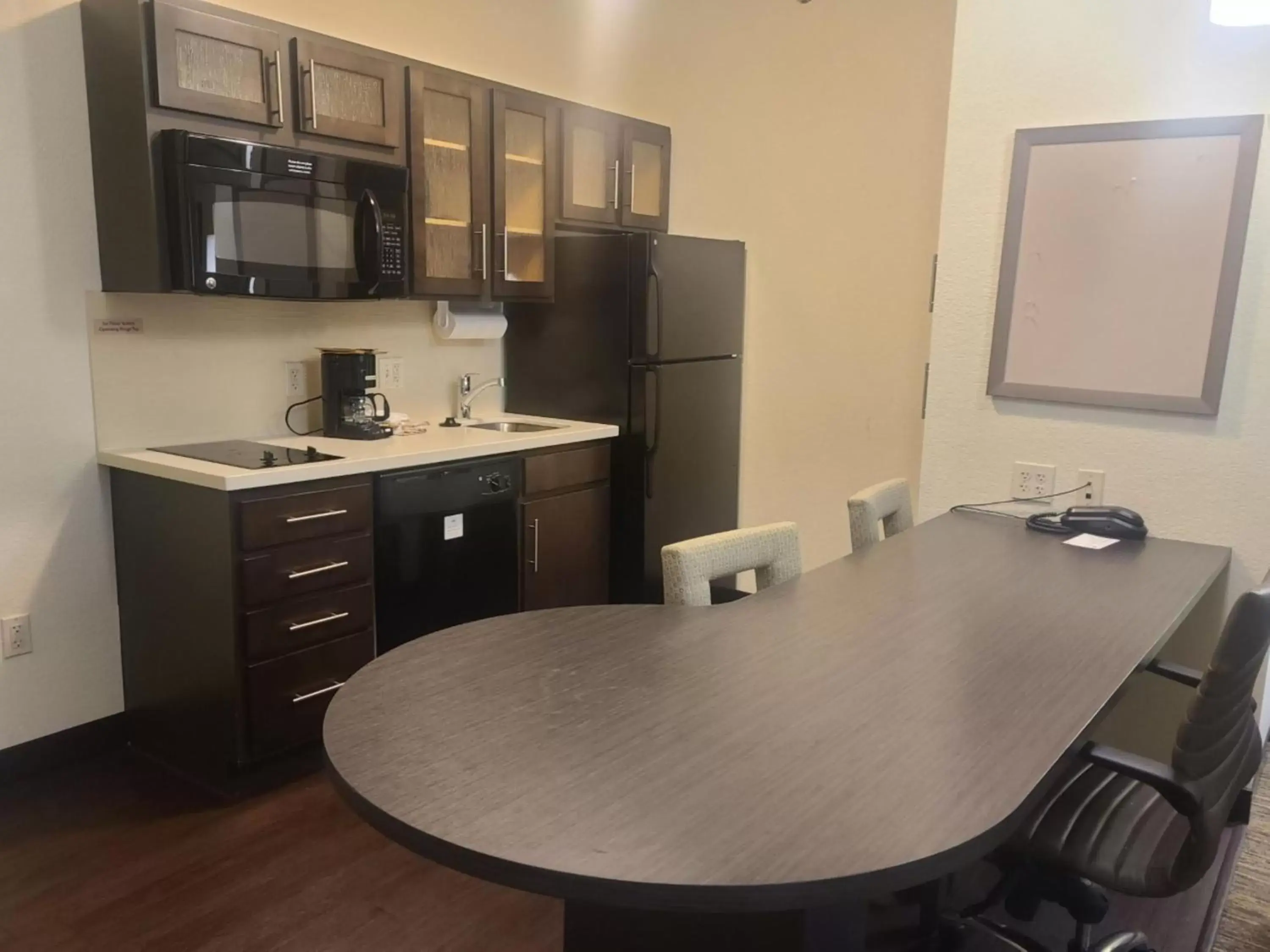 Photo of the whole room, Kitchen/Kitchenette in Candlewood Suites Bismarck