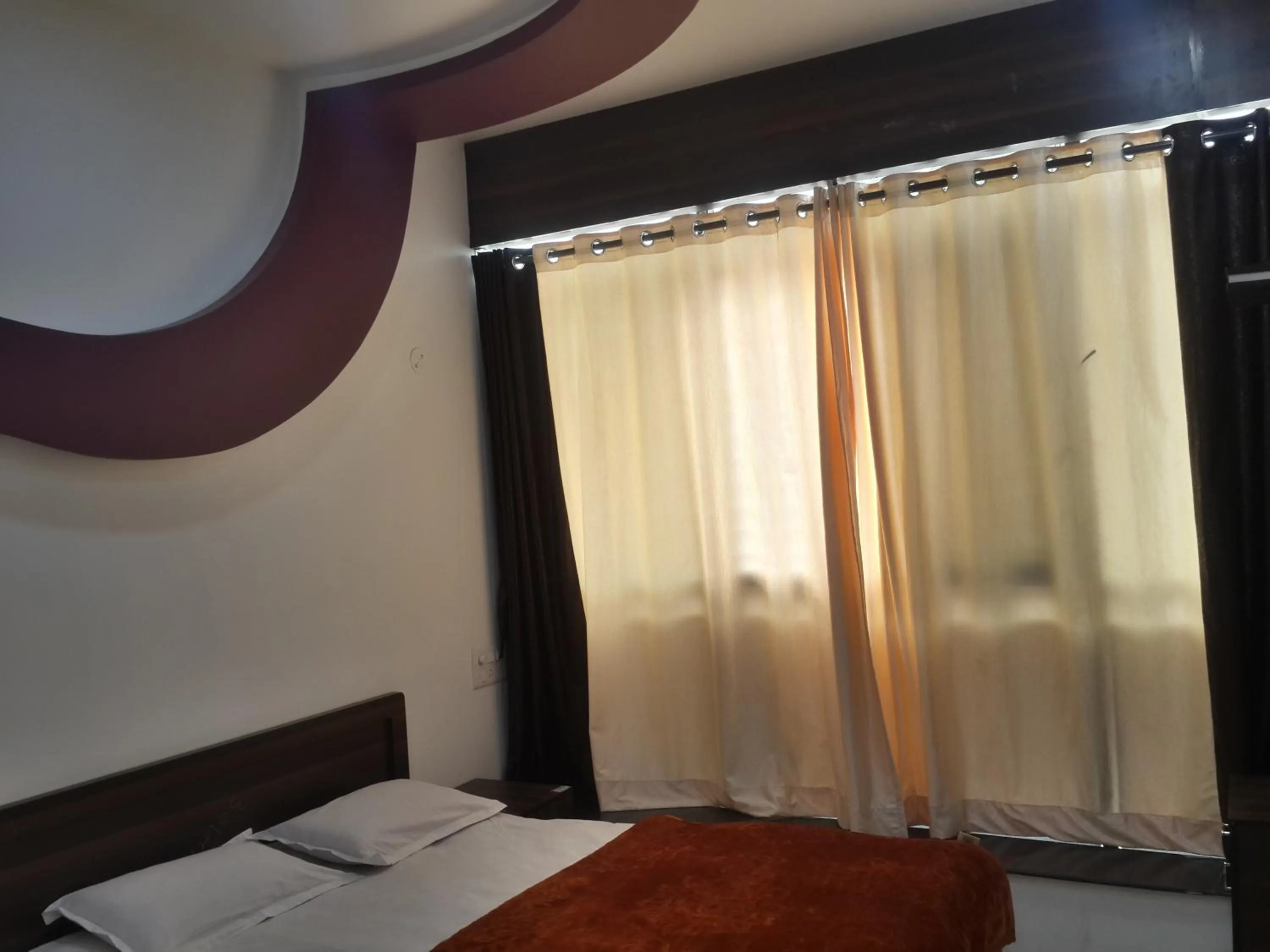 City view, Bed in Hotel Holiday Era Opposite Railway Station