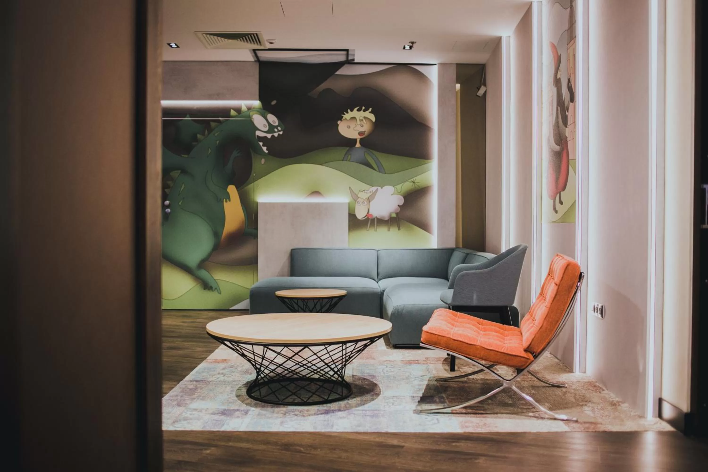 Communal lounge/ TV room in Holiday Inn Krakow City Centre by IHG