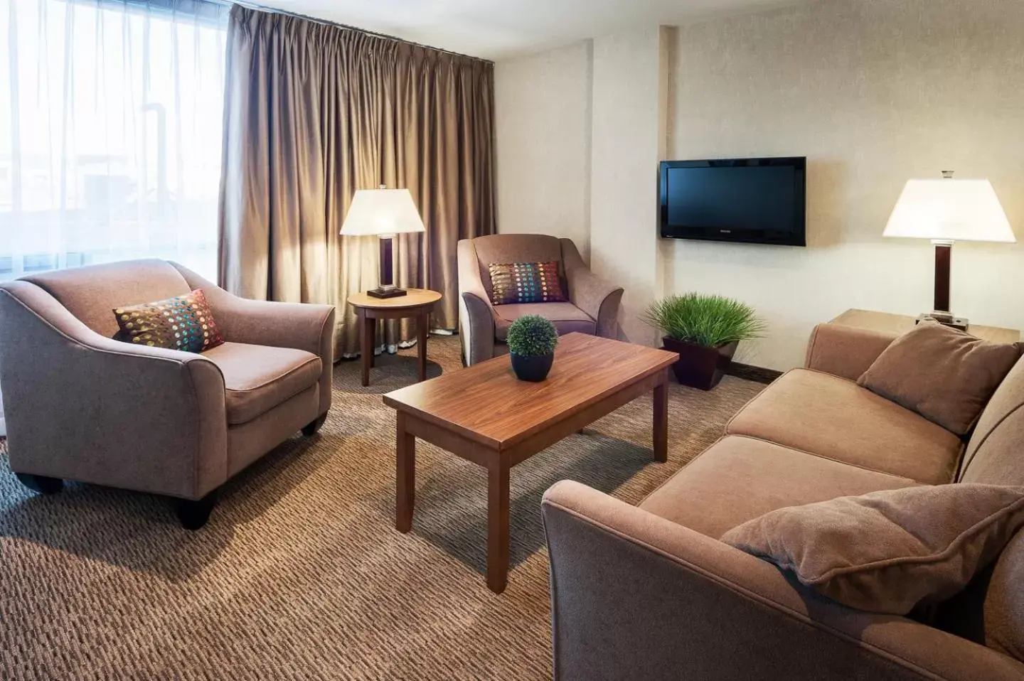 Living room, Seating Area in Carriage House Hotel and Conference Centre