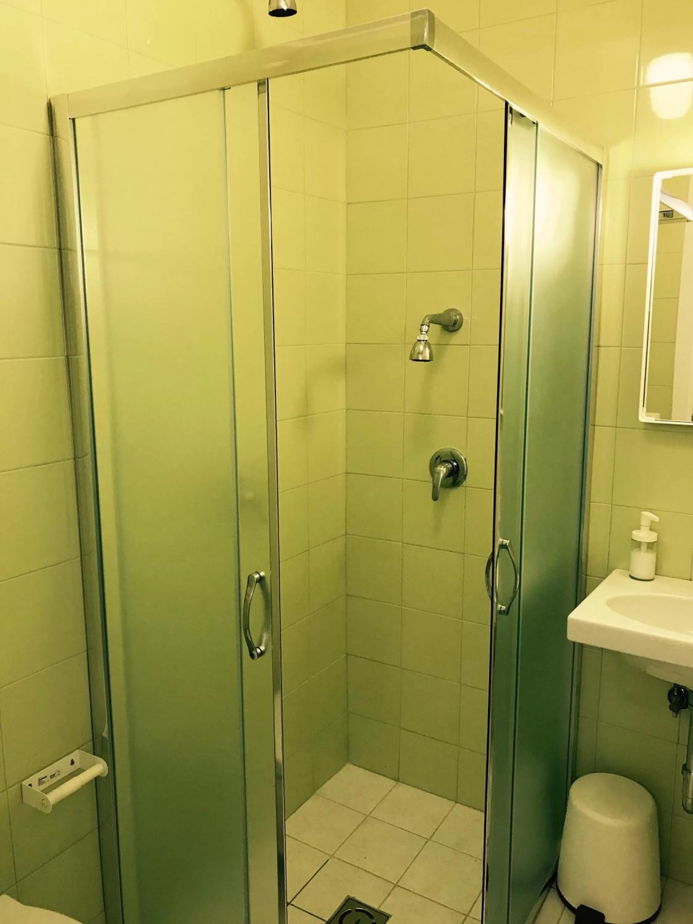 Bathroom in Aleksi rooms