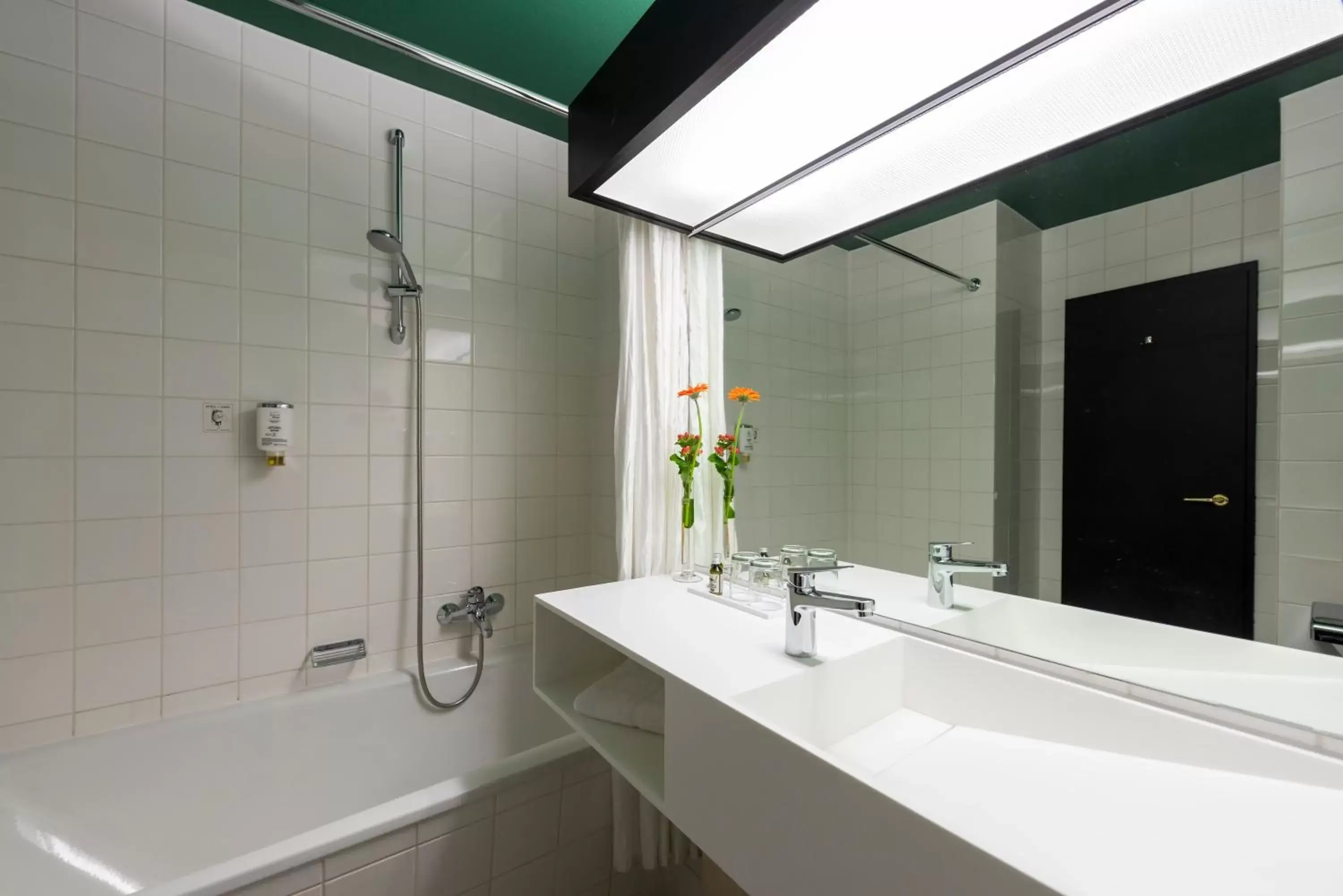 Shower, Bathroom in Wyndham Garden Donaueschingen