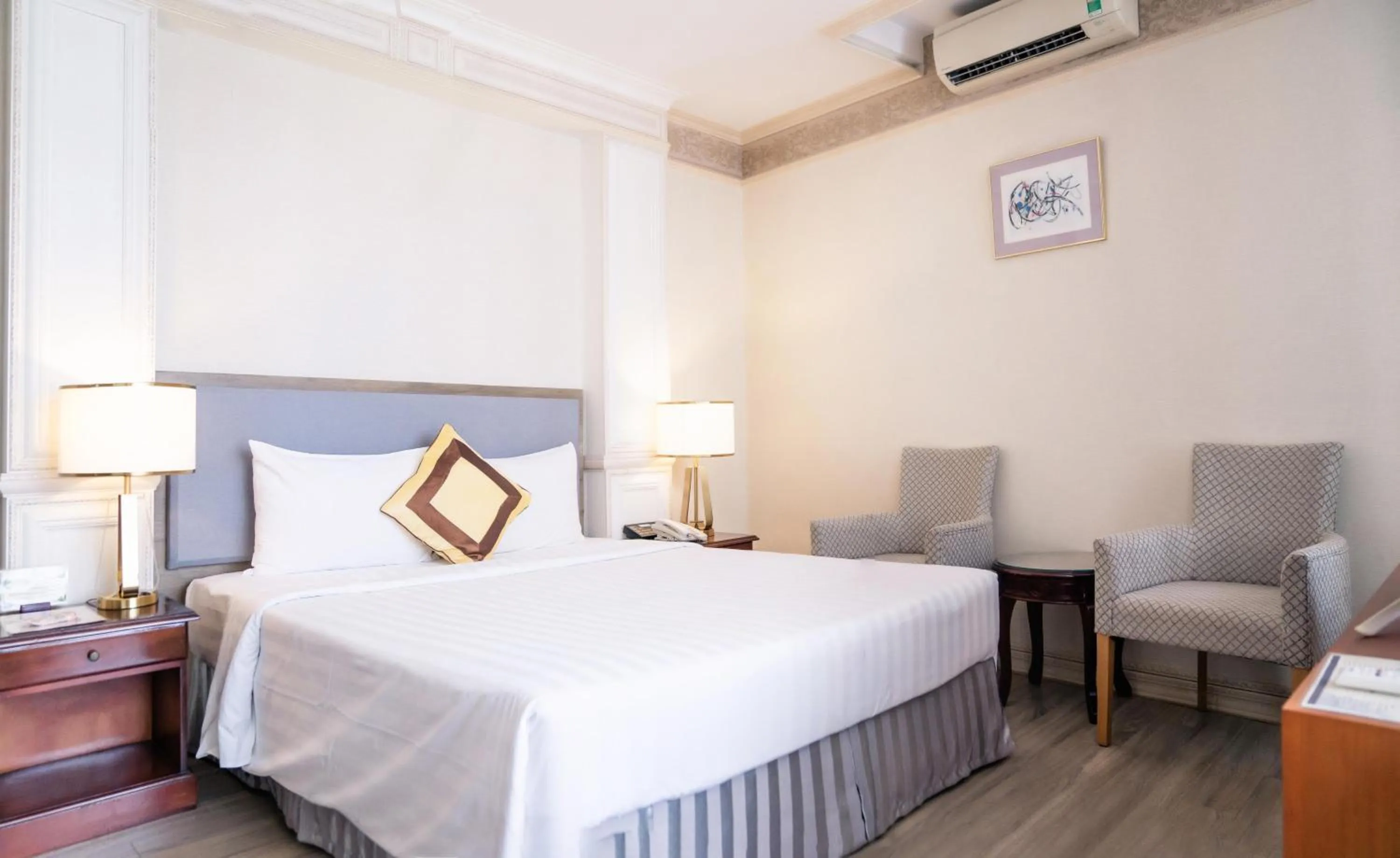 Bed in Lotus Saigon Hotel