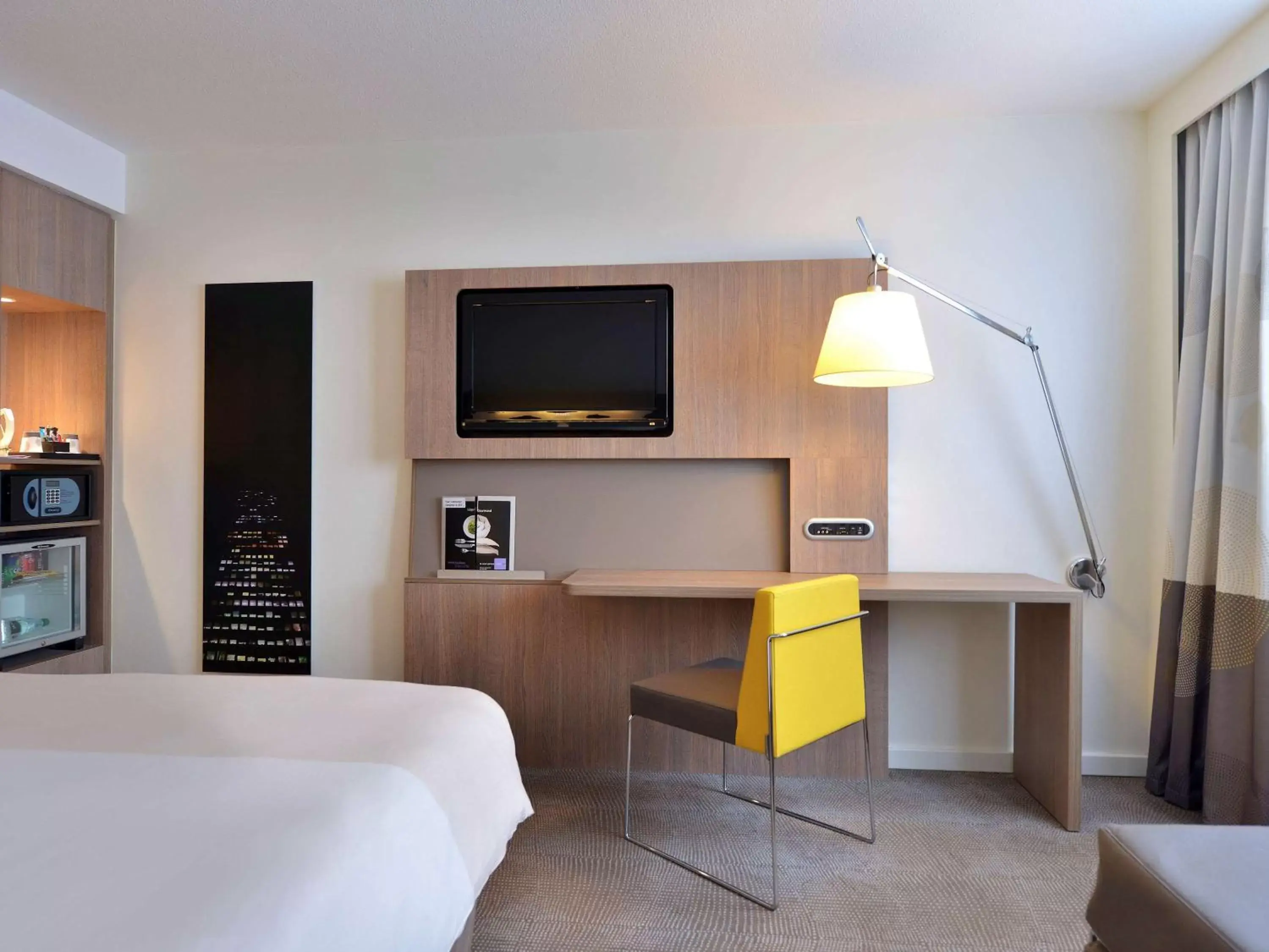 Photo of the whole room, TV/Entertainment Center in Novotel Clermont-Ferrand