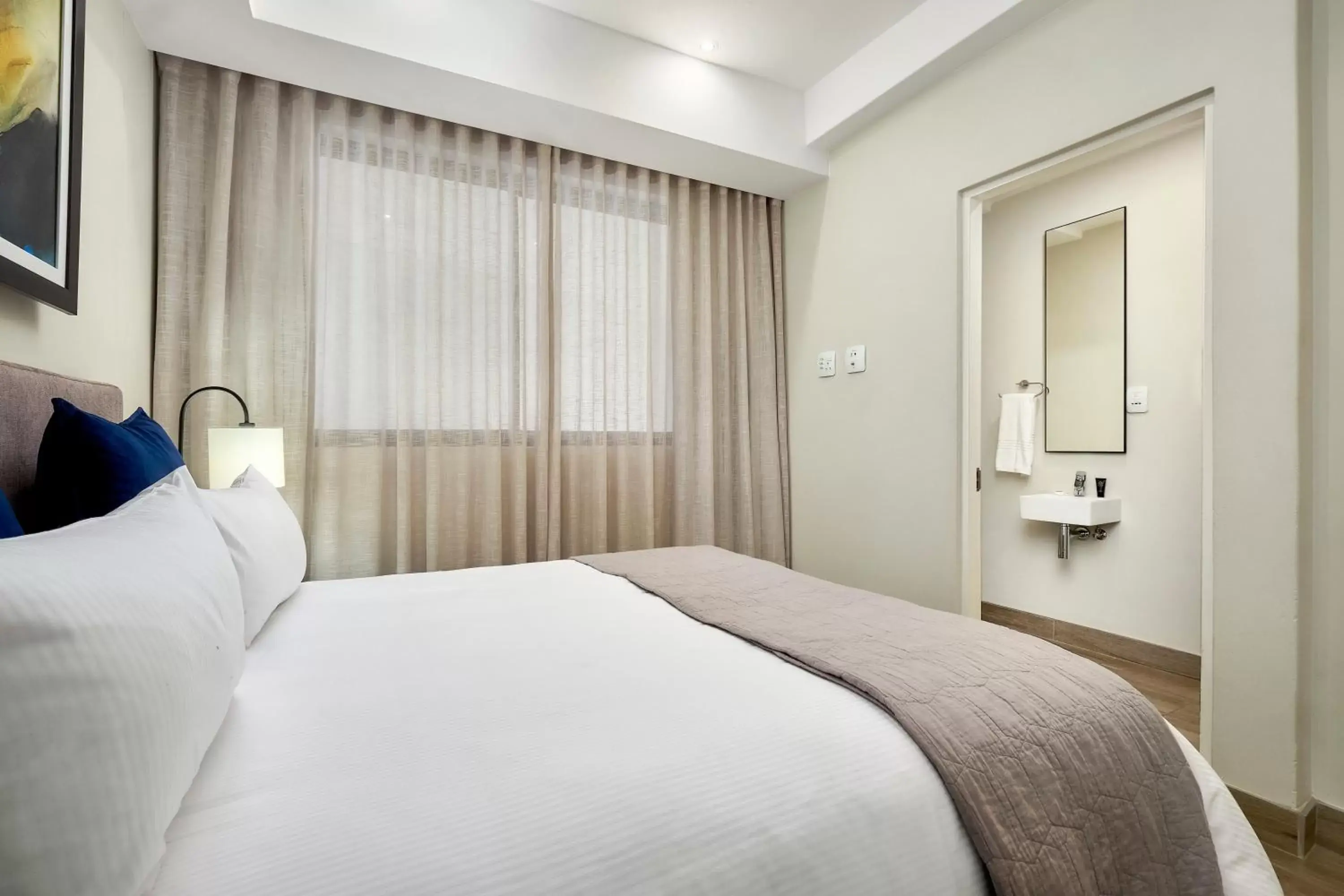 Bedroom, Bed in The Regency Apartment Hotel Menlyn