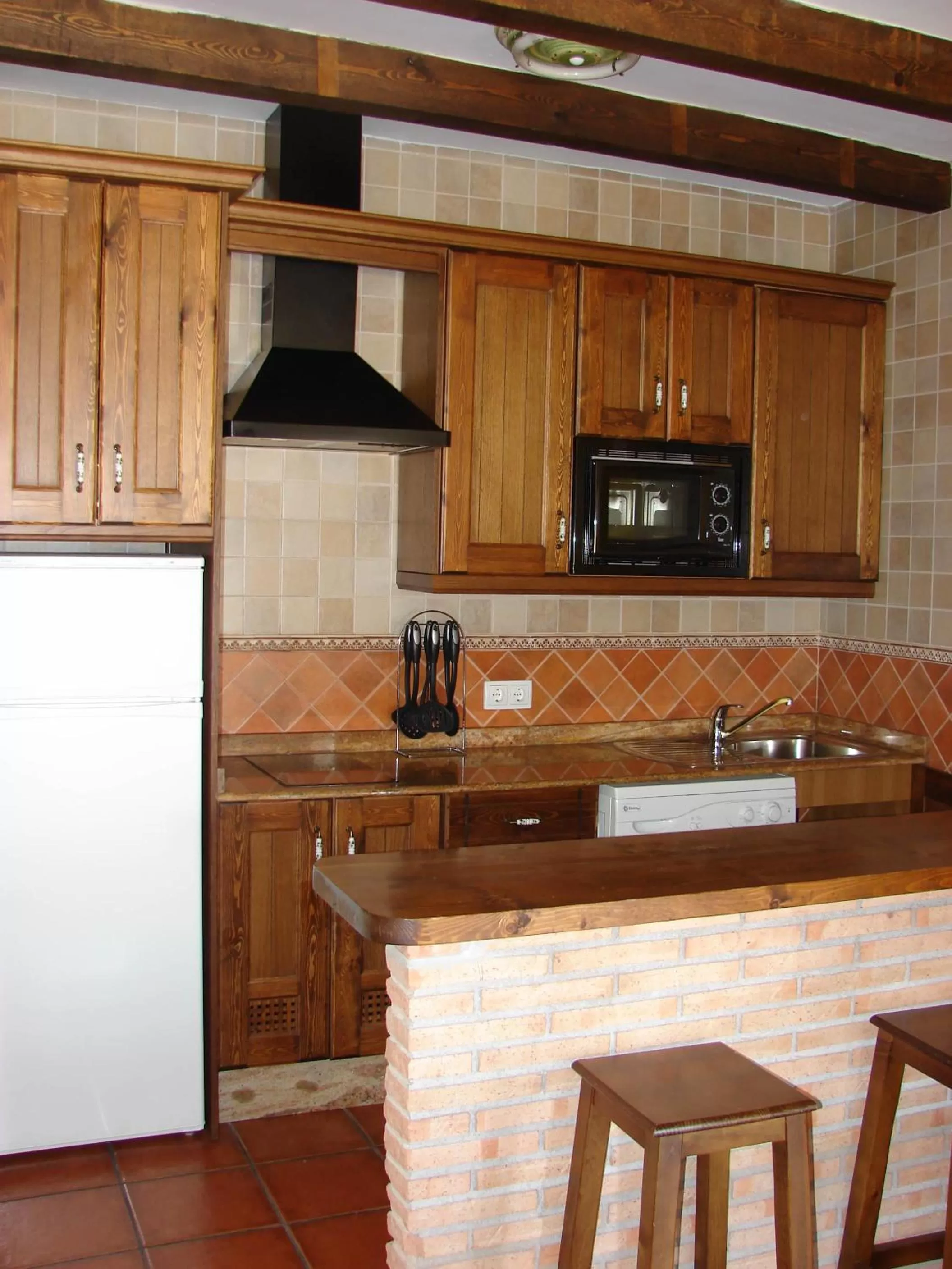 Kitchen or kitchenette in Apartamentos Sierra de Segura