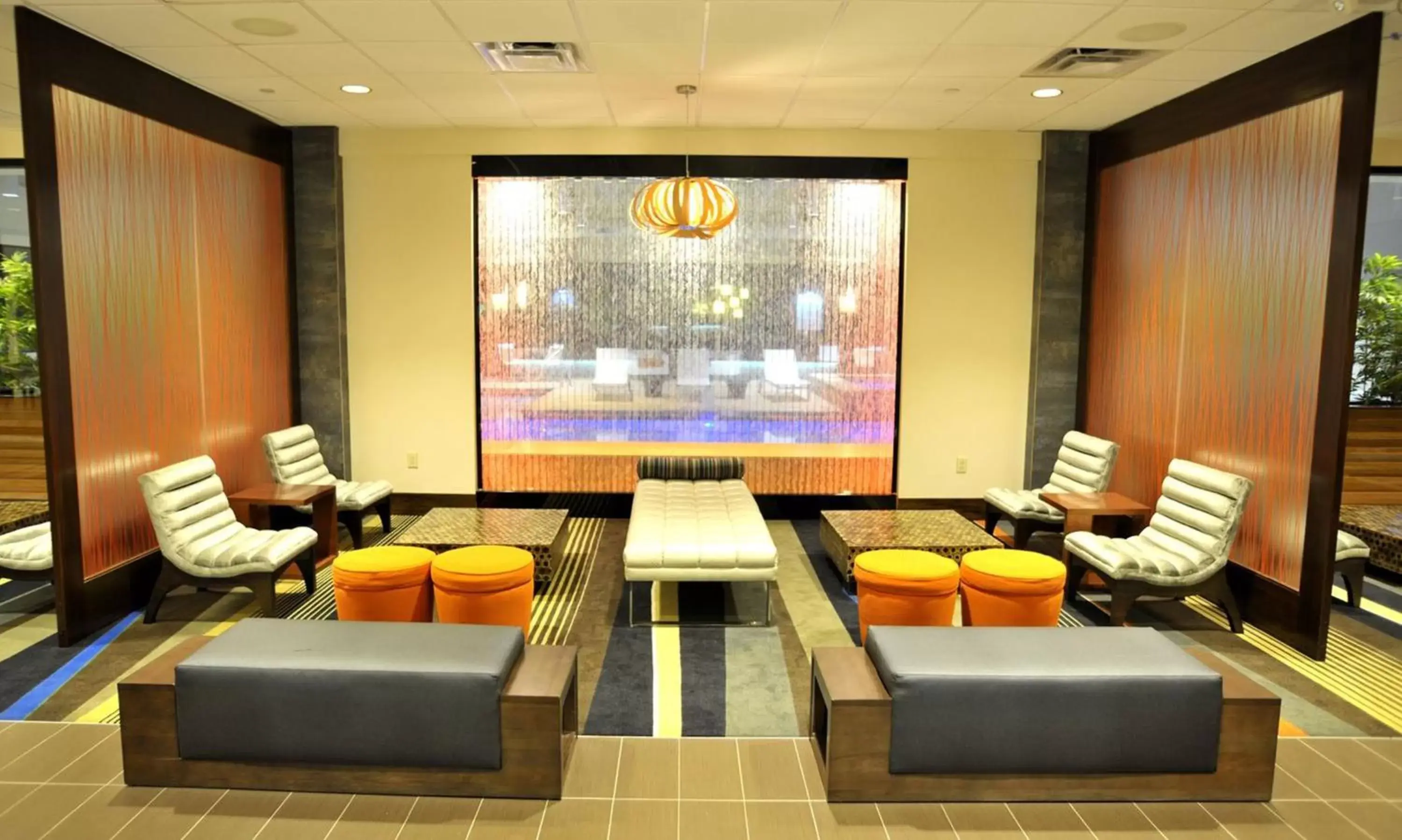 Lobby or reception, Seating Area in Holiday Inn and Suites Charleston West, an IHG Hotel