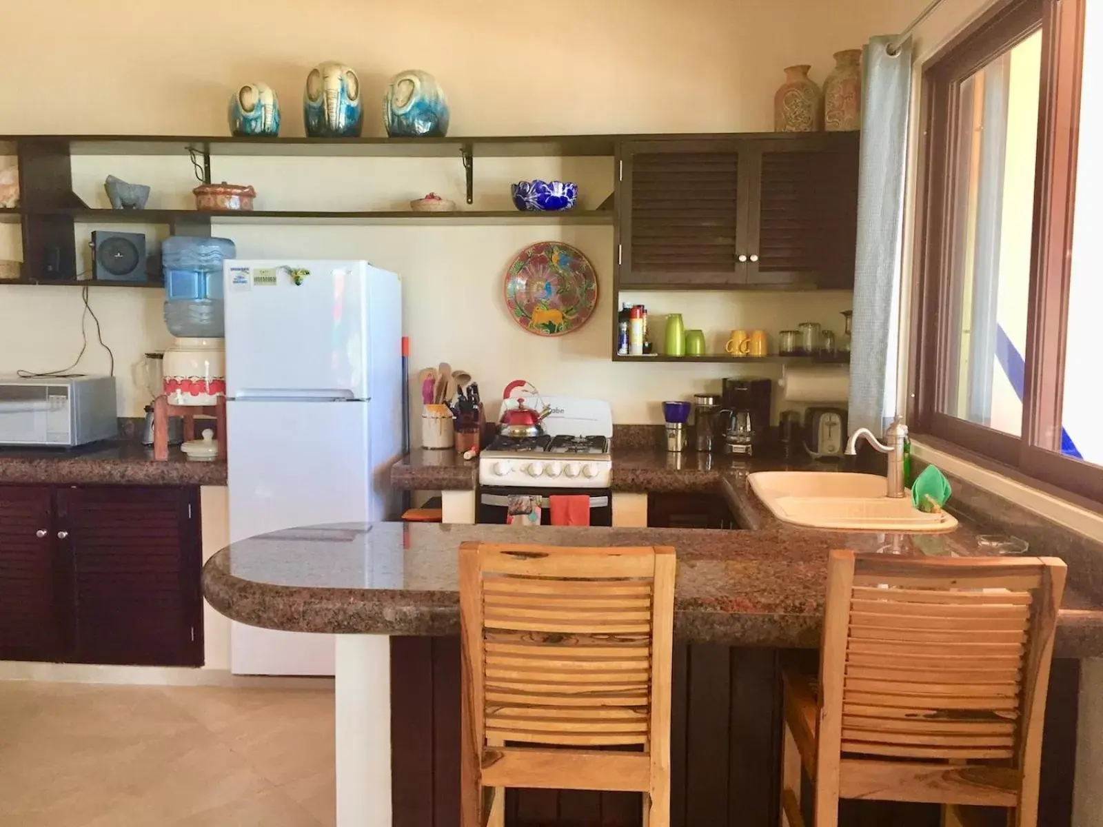 Kitchen/Kitchenette in Nah Uxibal Villa and Casitas