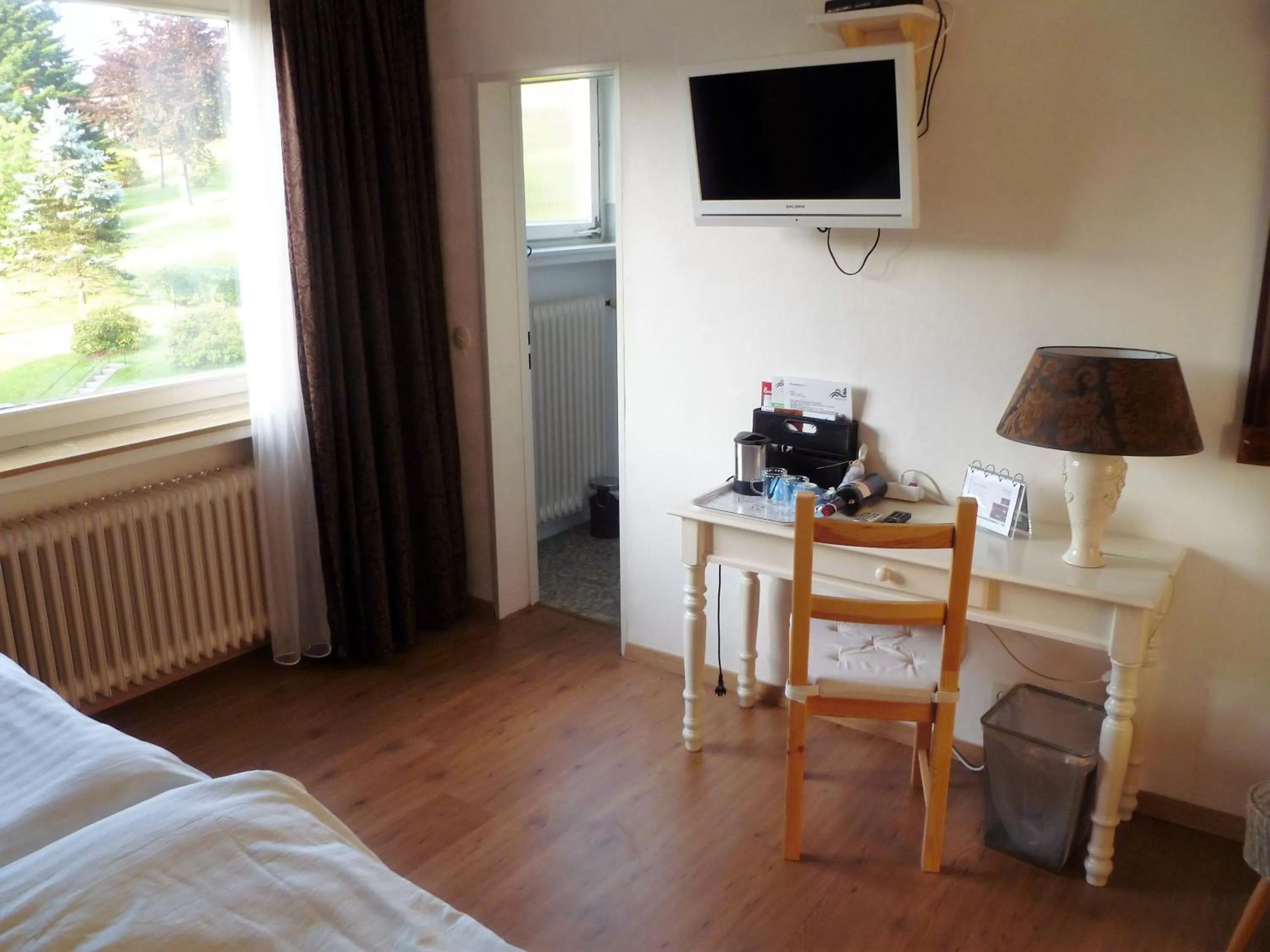 Bedroom, TV/Entertainment Center in B&B Orchidee