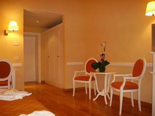 Bedroom, Dining Area in Casa Romagnosi