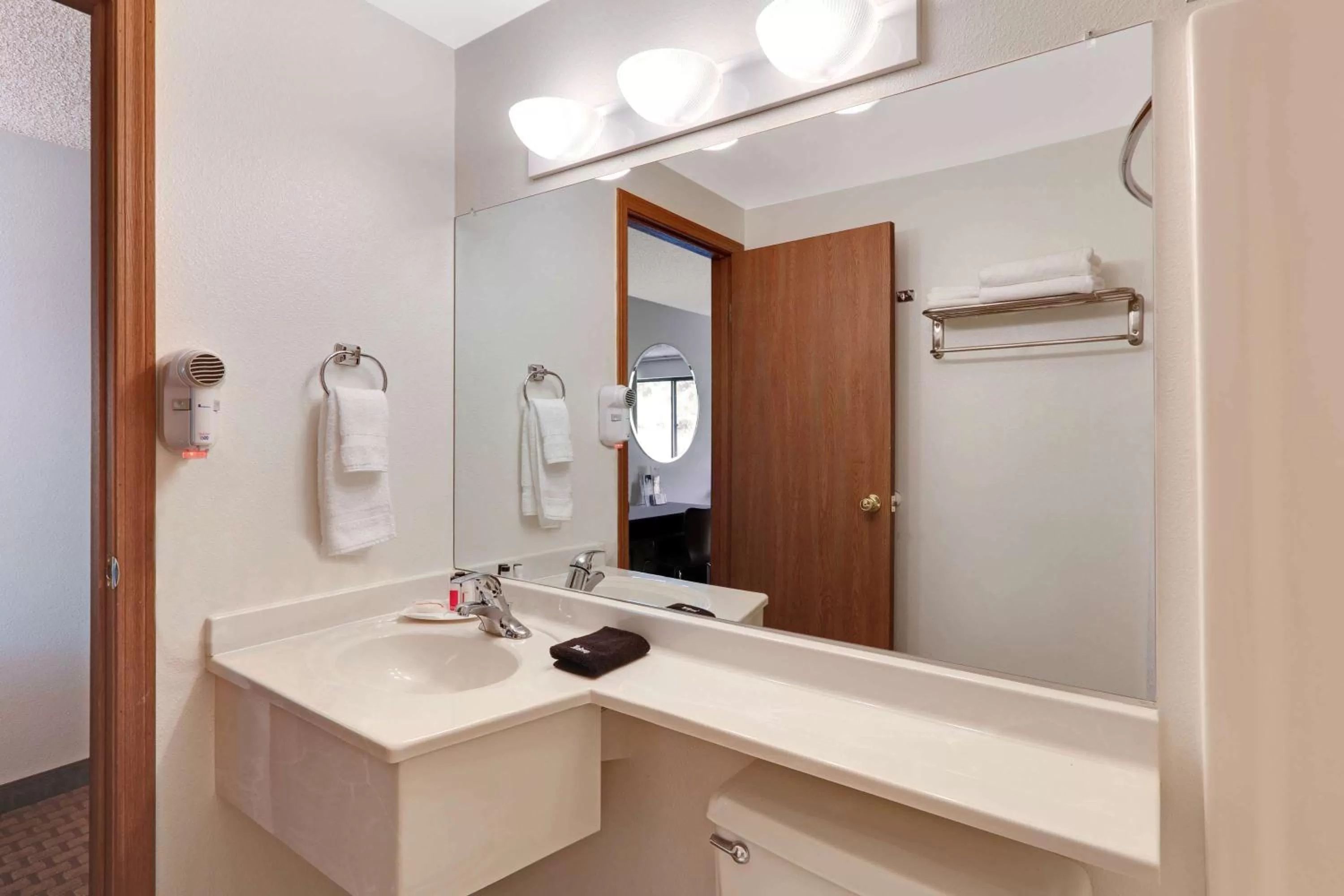 Bathroom in Super 8 by Wyndham Cody