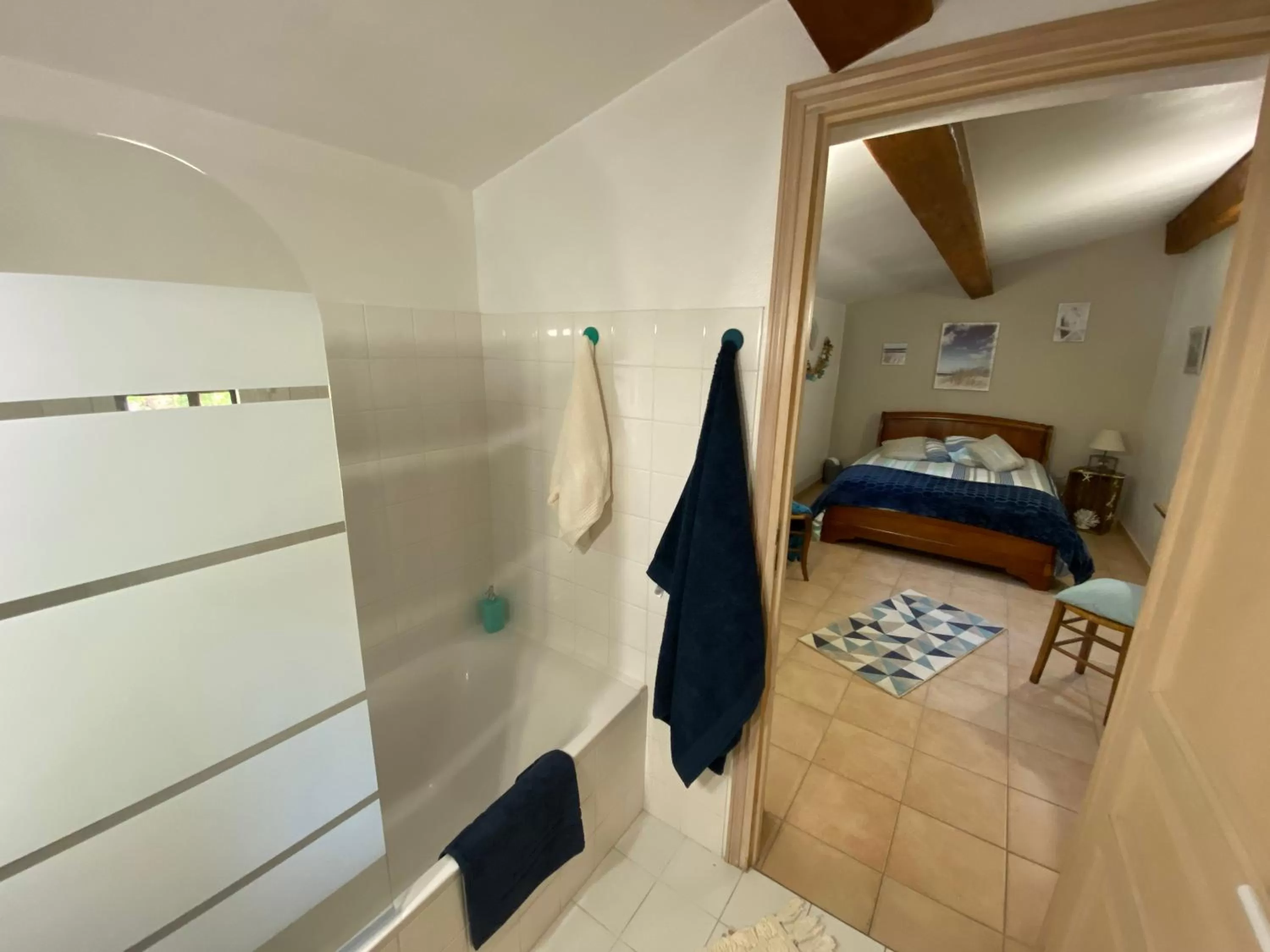 Bathroom, Bed in villa santa rita