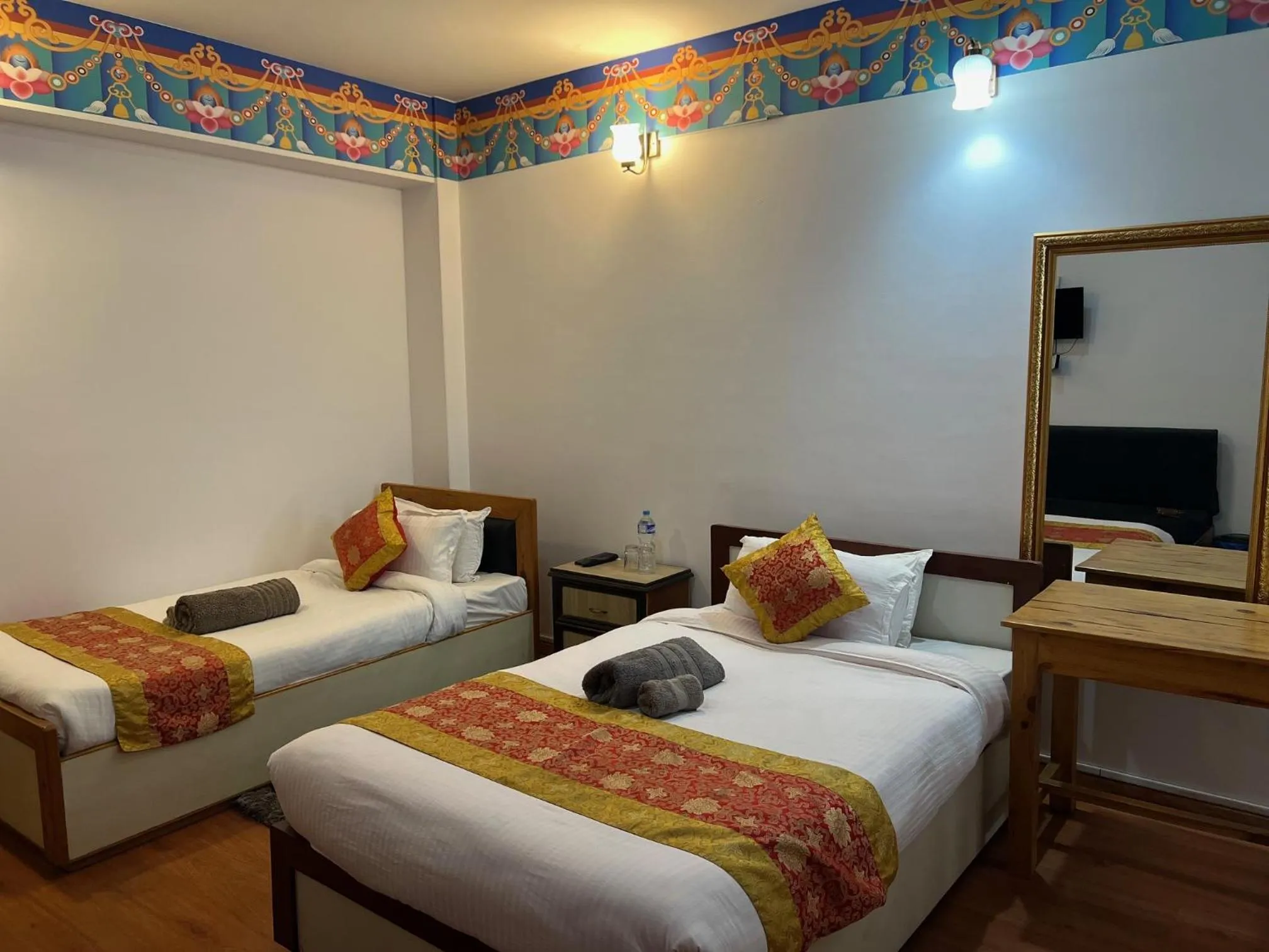 Bed in The Boudha Inn