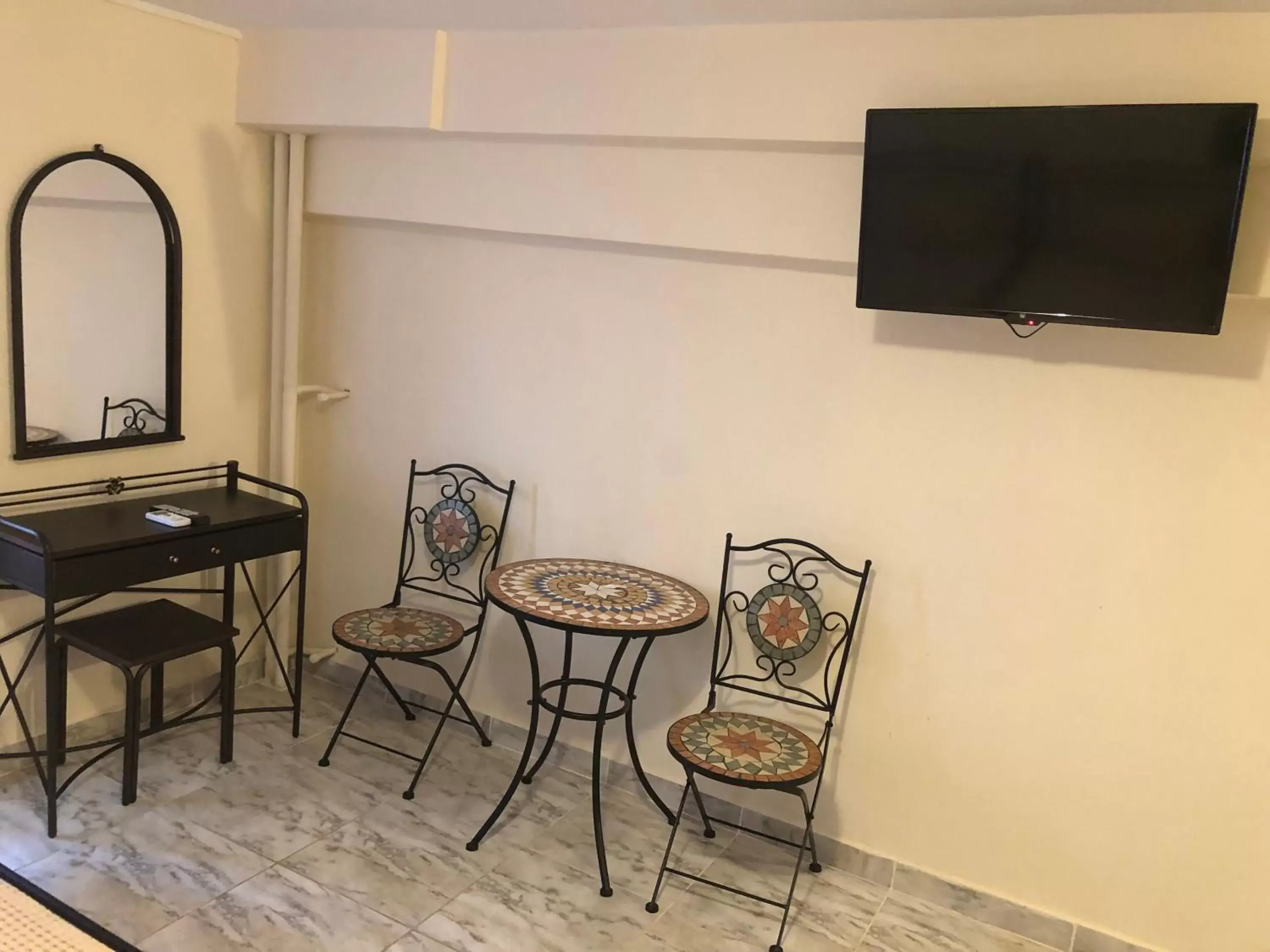 TV/Entertainment Center in Nikolakakis Rooms Lavrio