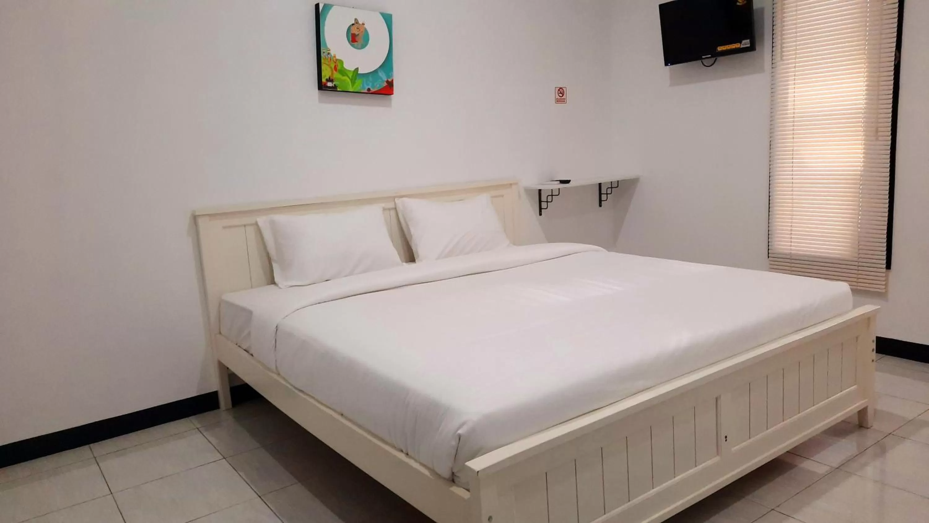 Bed in COZY STAY KUPANG