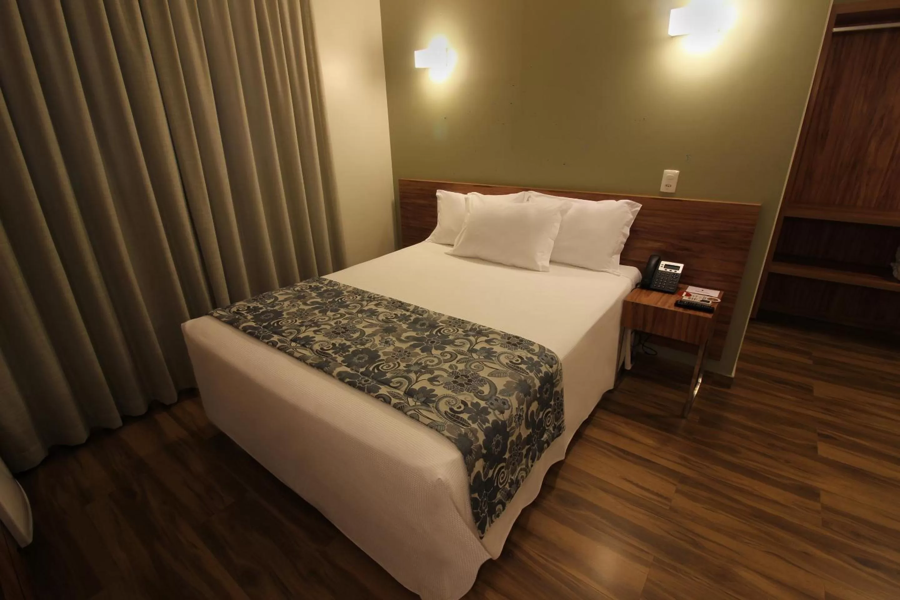 Bed in Impar Suites Barao de Cocais