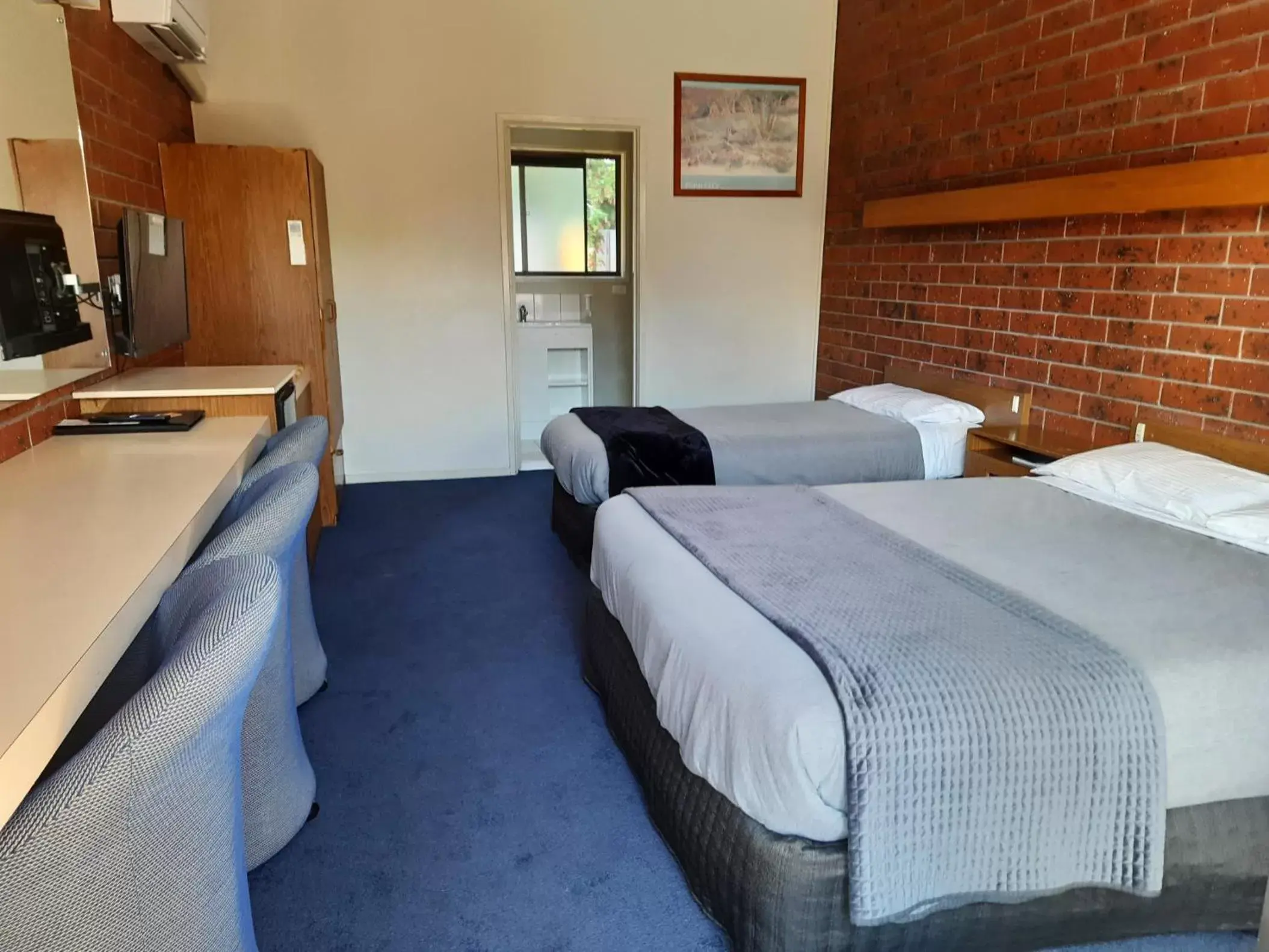 Bed in Abbotswood Motor Inn
