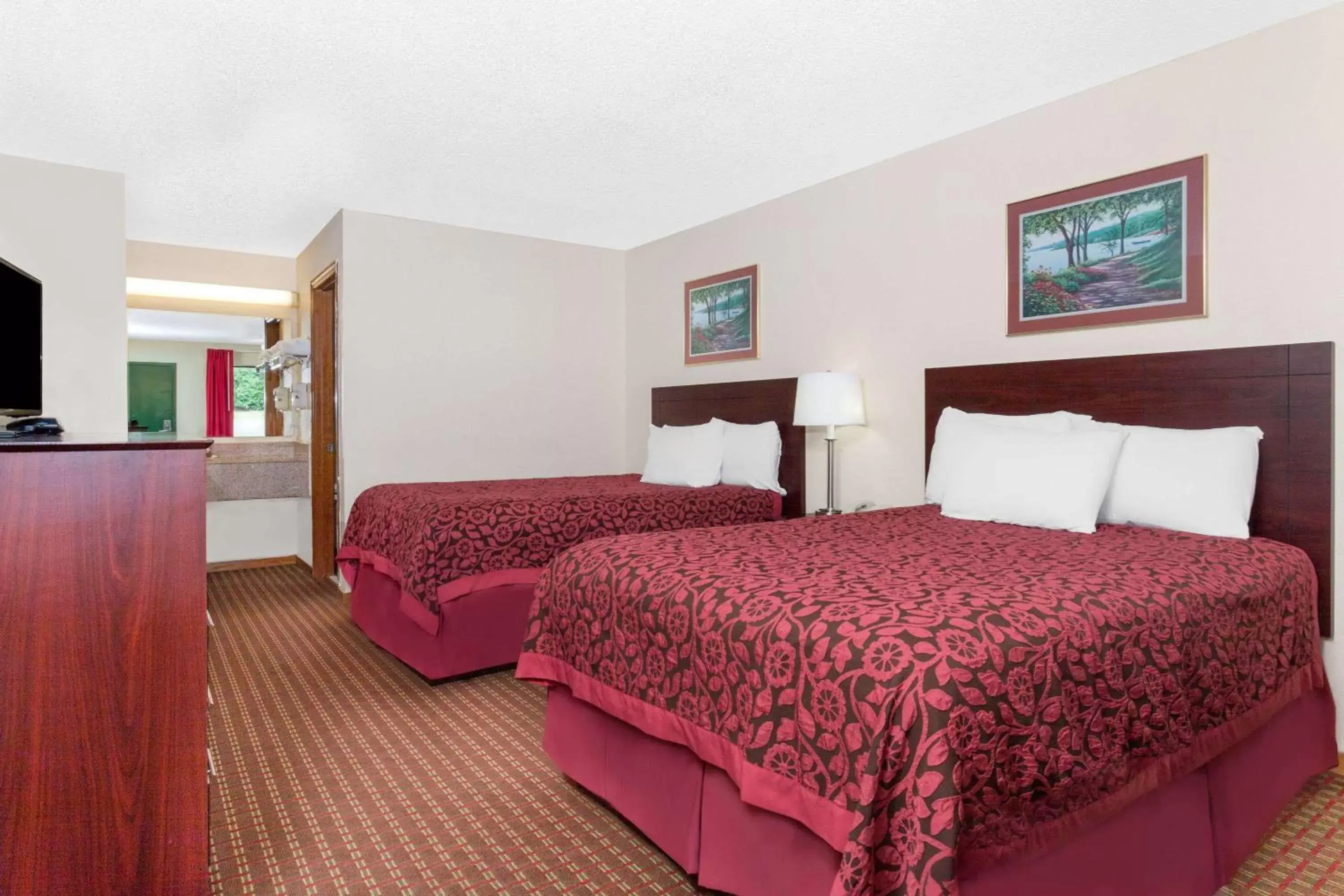 Photo of the whole room, Bed in Days Inn by Wyndham Columbia NE Fort Jackson