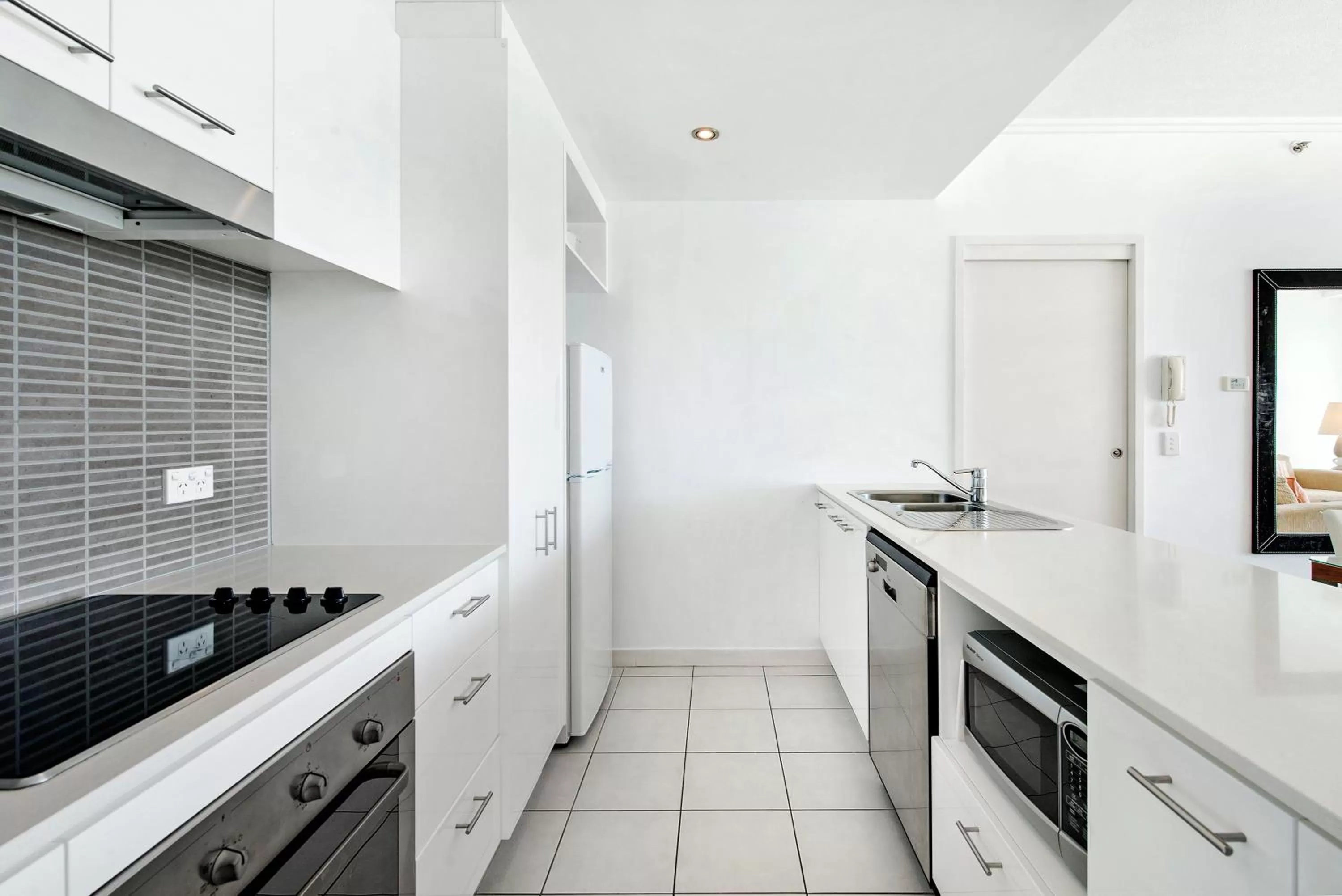 kitchen in ULTIQA Freshwater Point Resort Broadbeach