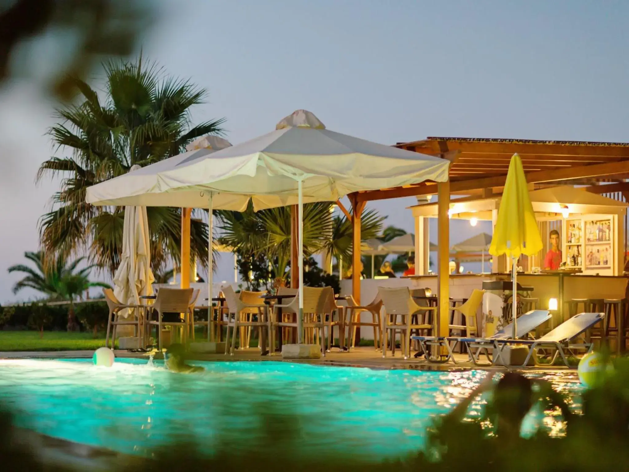 Lounge or bar, Swimming Pool in Ilian Beach