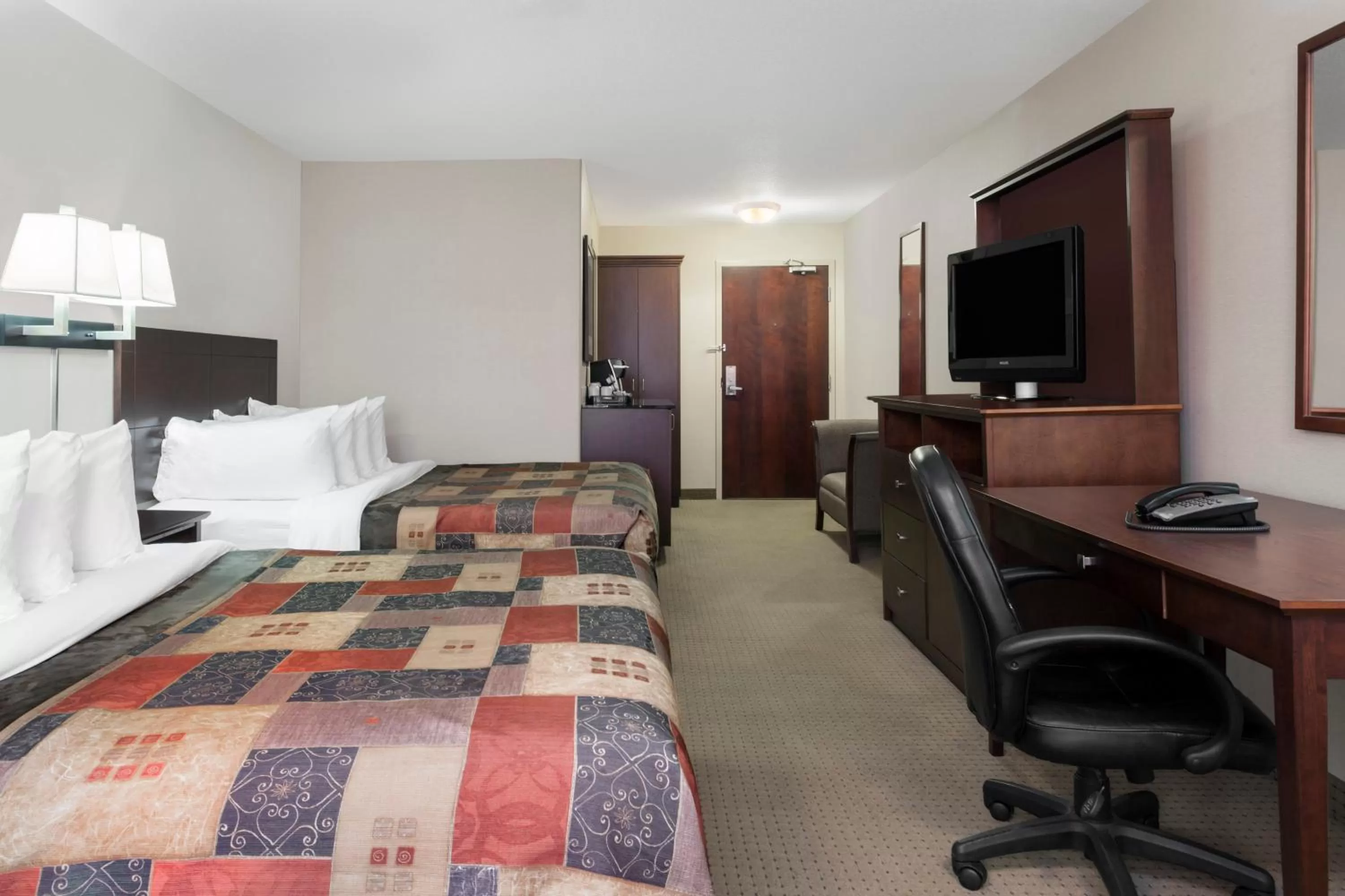 Photo of the whole room, Bed in Ramada by Wyndham Weyburn
