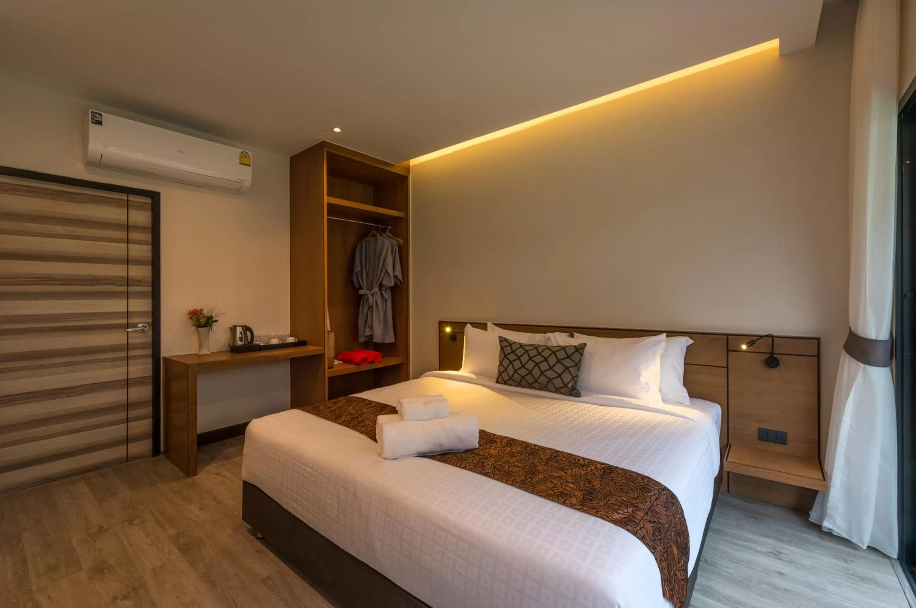 Bed in Cher​mantra​ Aonang​ Resort & Pool​ Suite