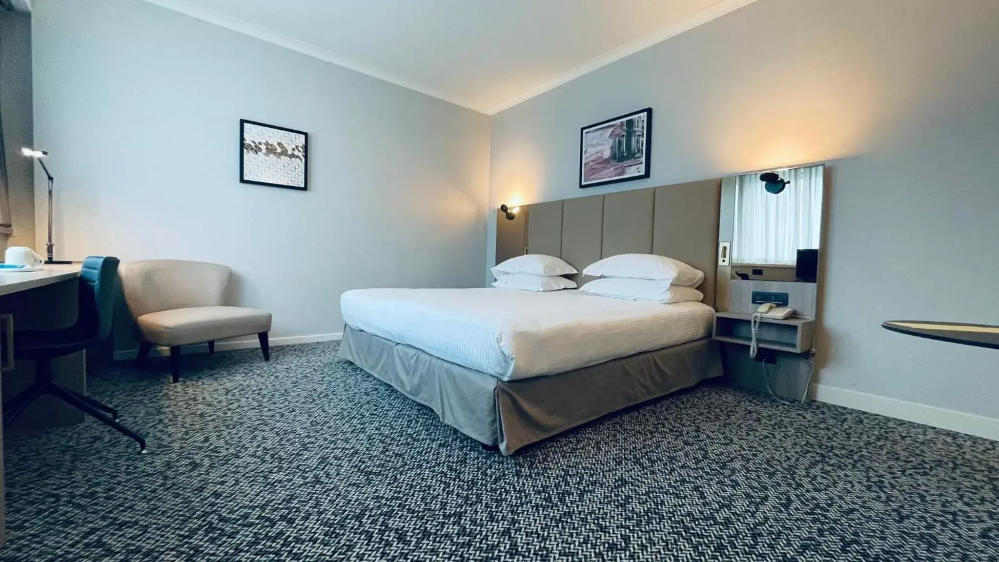 Photo of the whole room, Bed in Crowne Plaza Milan Linate, an IHG Hotel