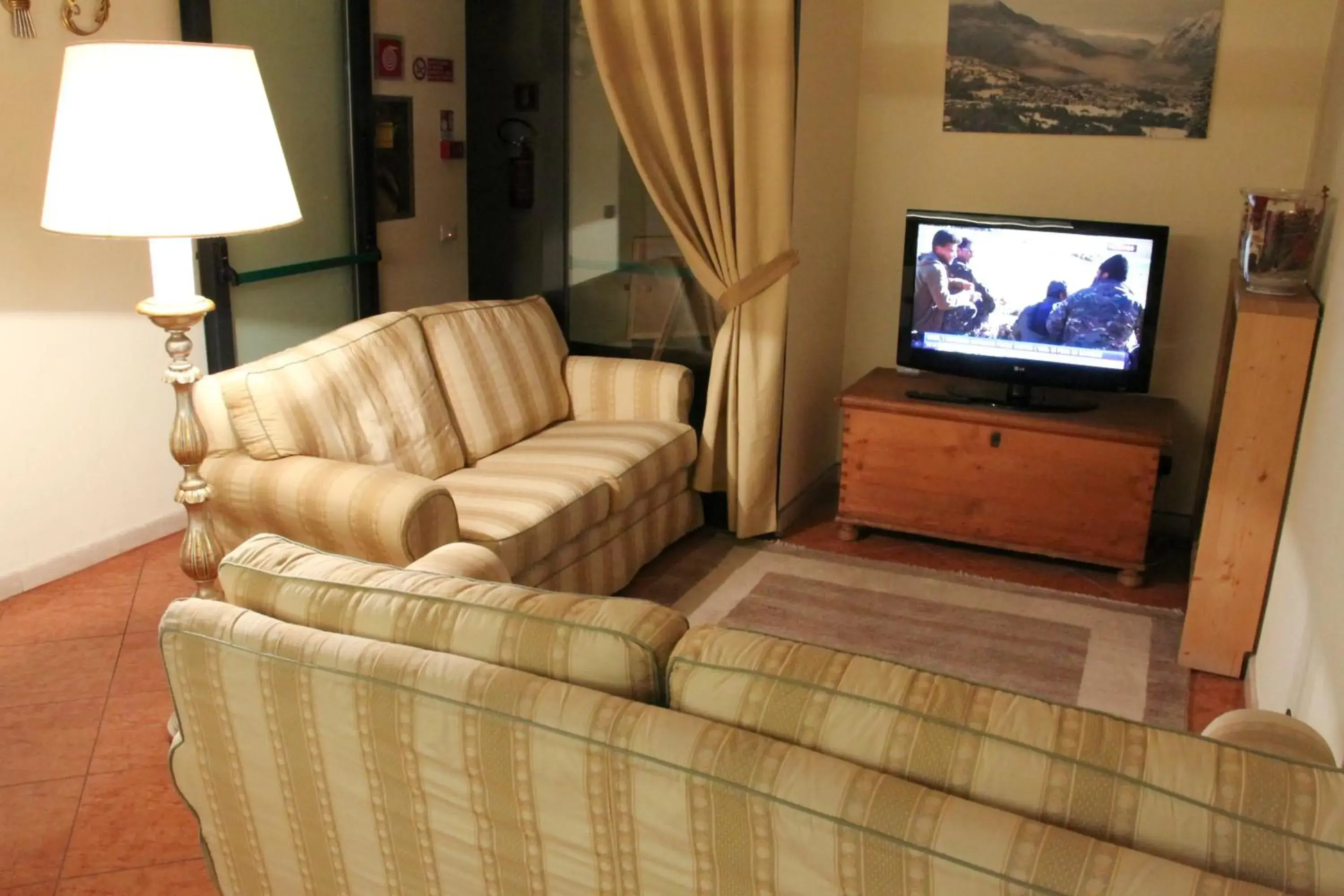 Communal lounge/ TV room, Seating Area in Hotel Belvedere Dolomiti