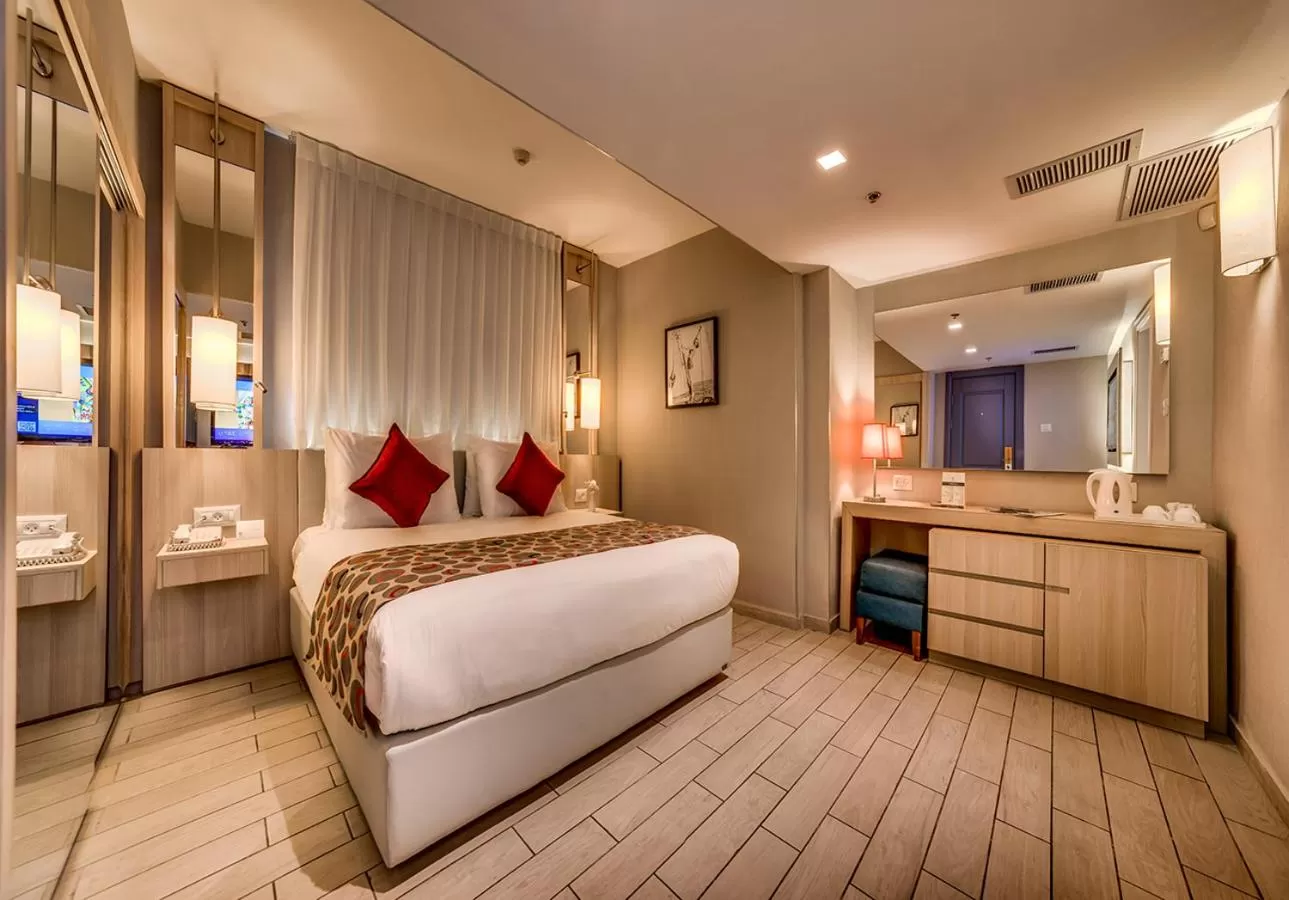 Bed in Astral Maris Hotel