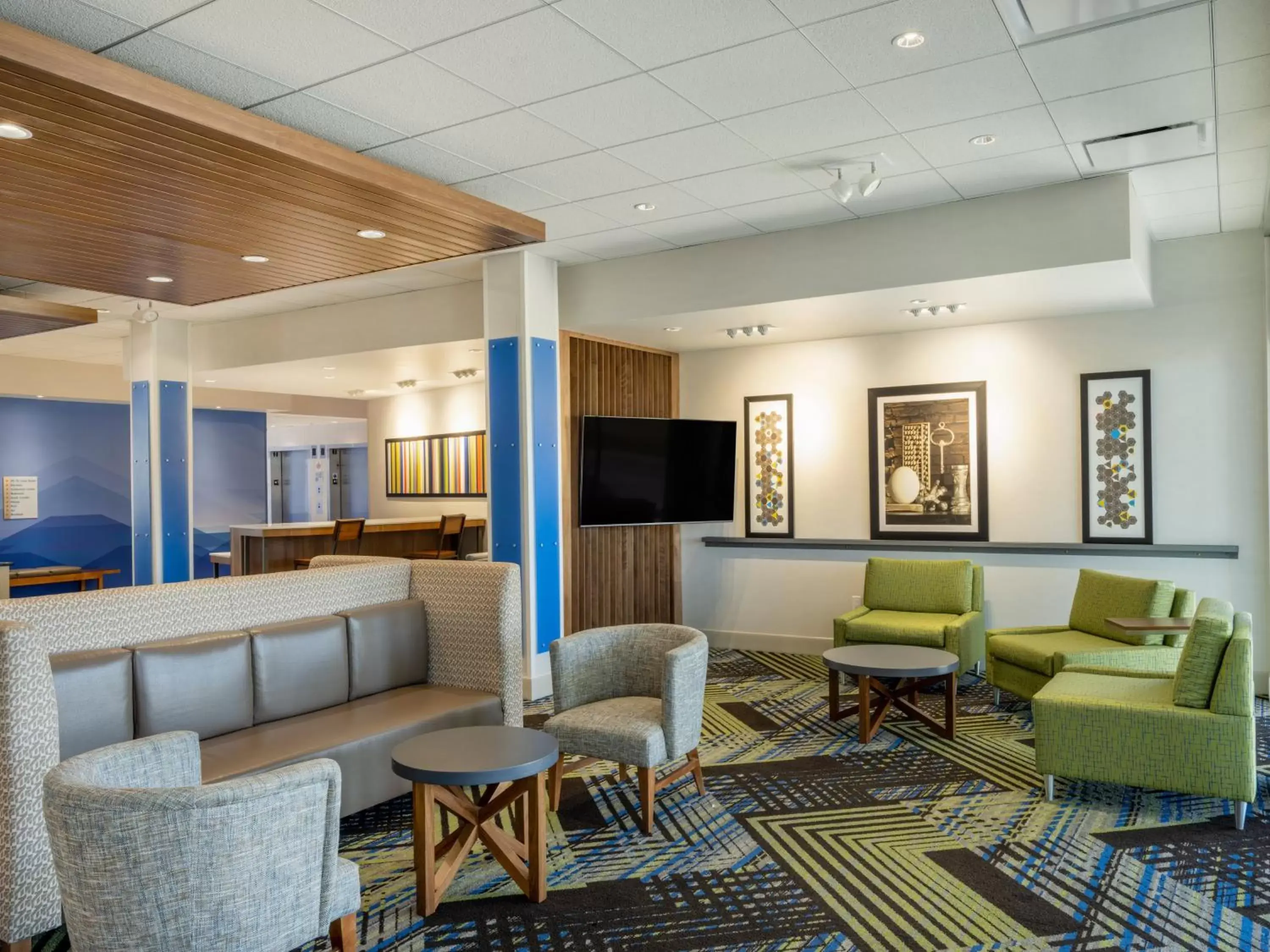 Property building, Seating Area in Holiday Inn Express & Suites - Watertown, an IHG Hotel