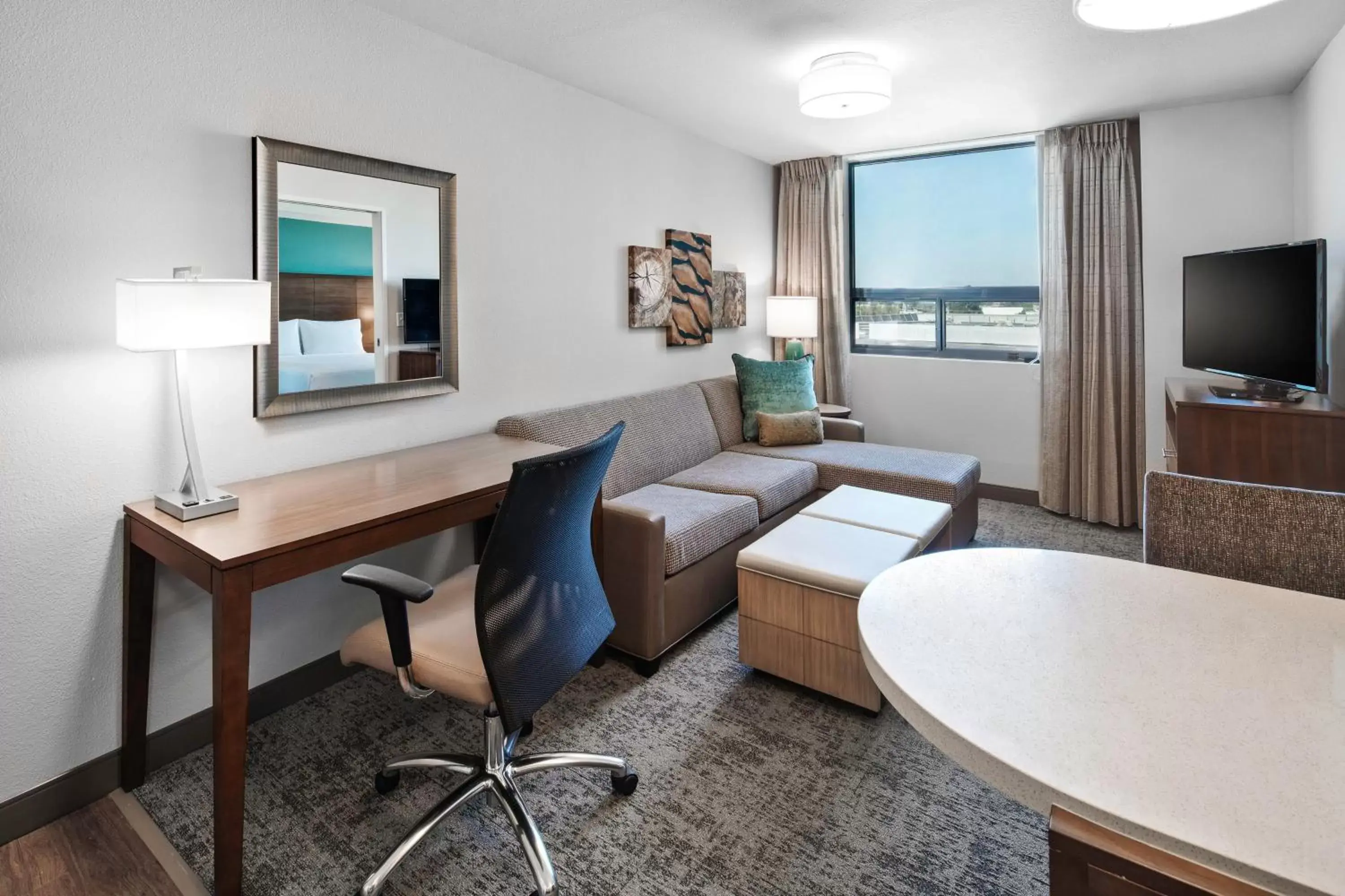 Photo of the whole room, Seating Area in Staybridge Suites Irvine - John Wayne Airport, an IHG Hotel