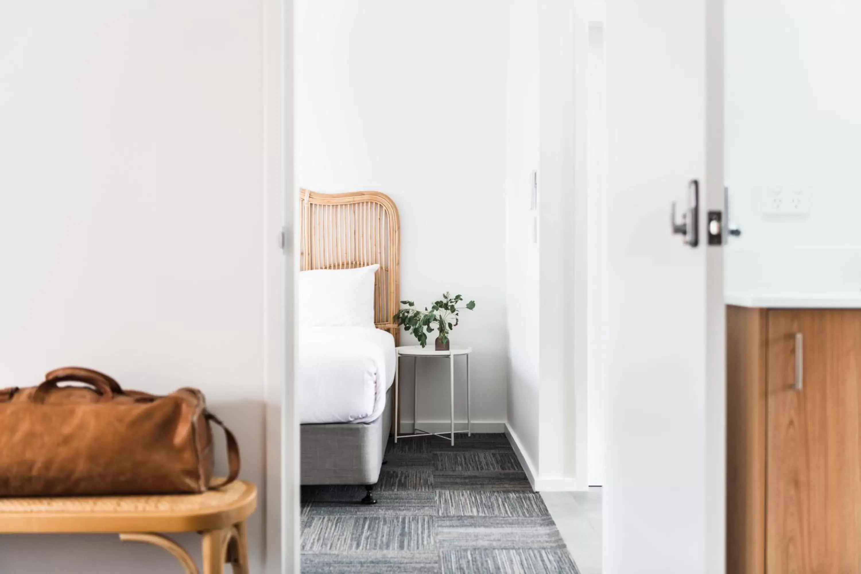 Bedroom, Seating Area in The Ned Ryan Motel