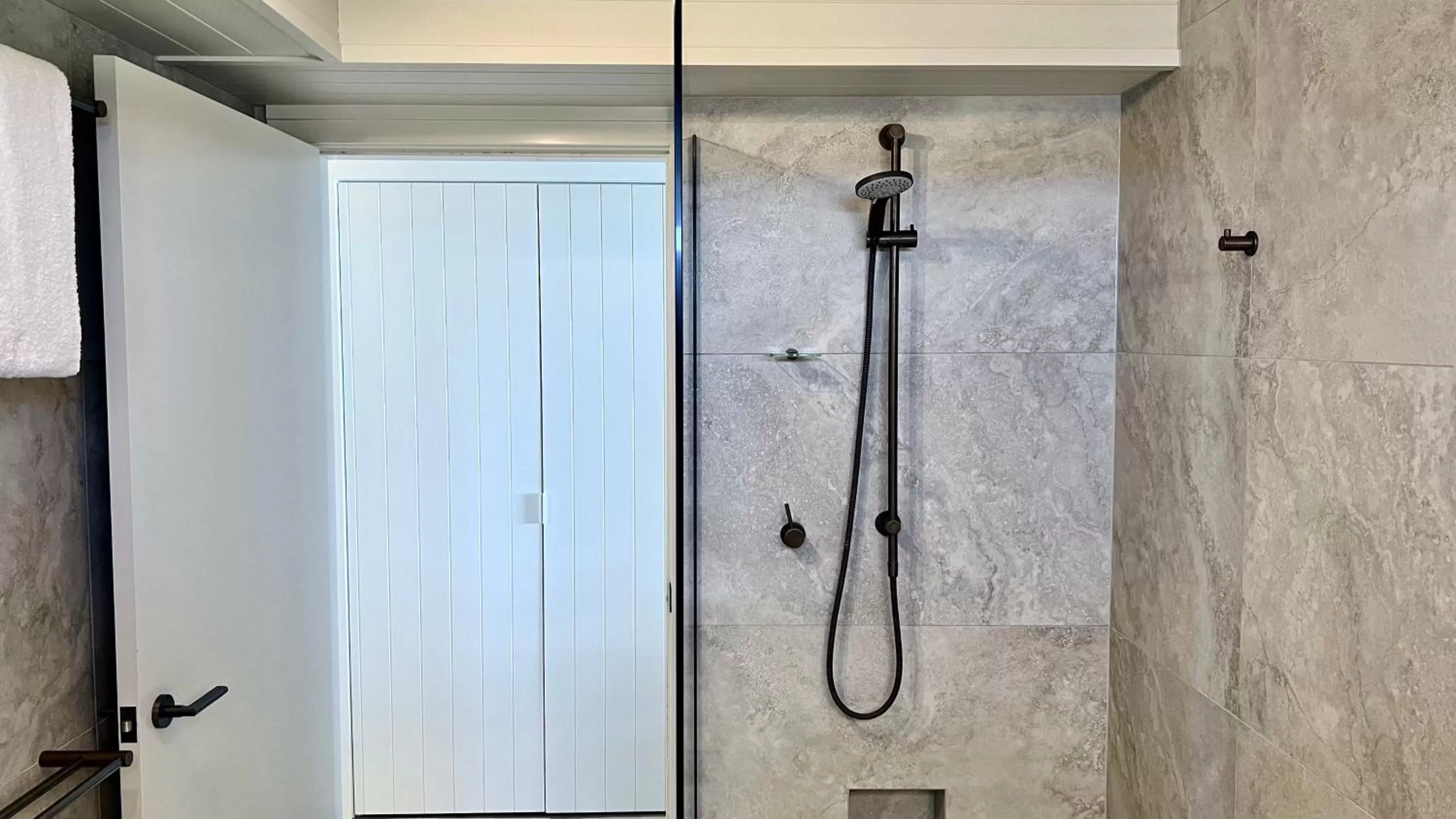 Shower in 84 The Spit Holiday Apartments