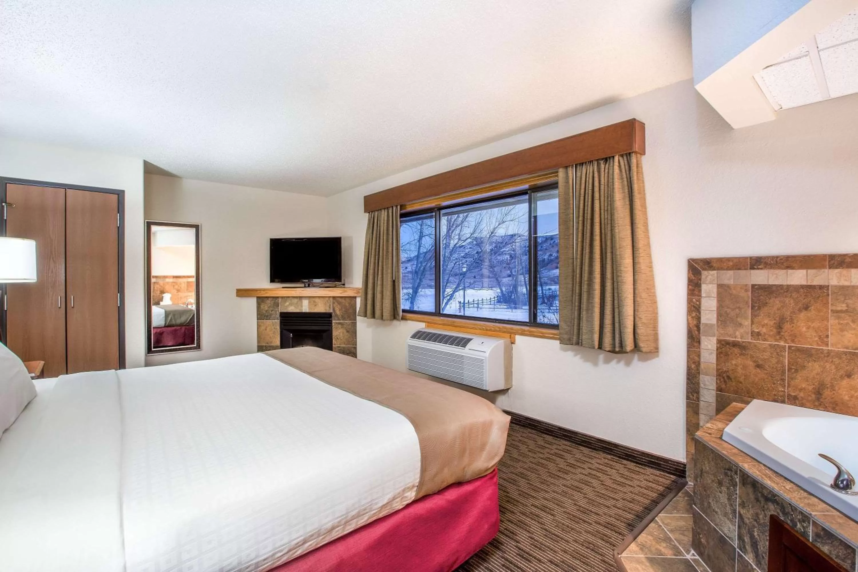 Photo of the whole room, Bed in AmericInn by Wyndham Medora