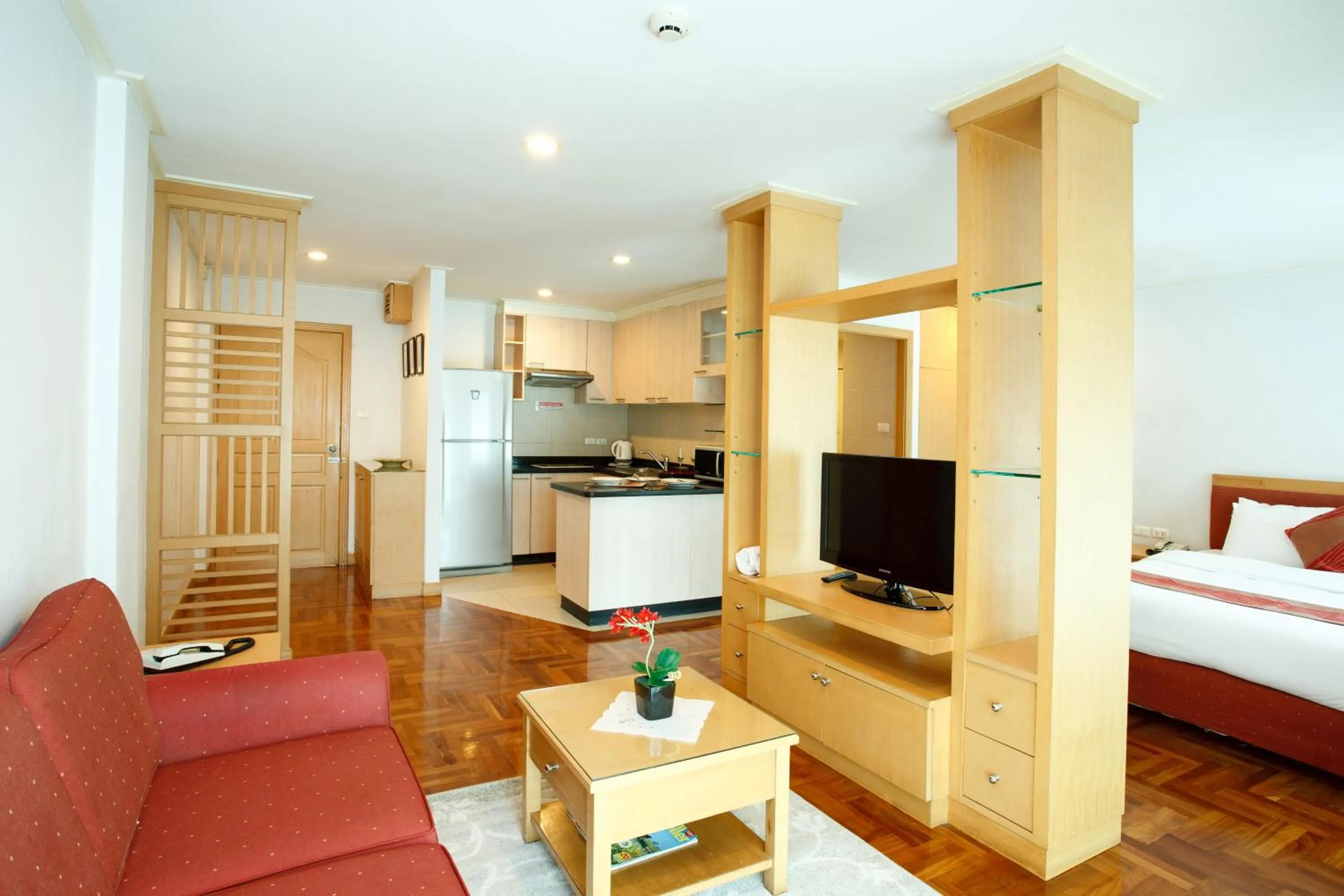 Living room, Bed in Chaidee Mansion