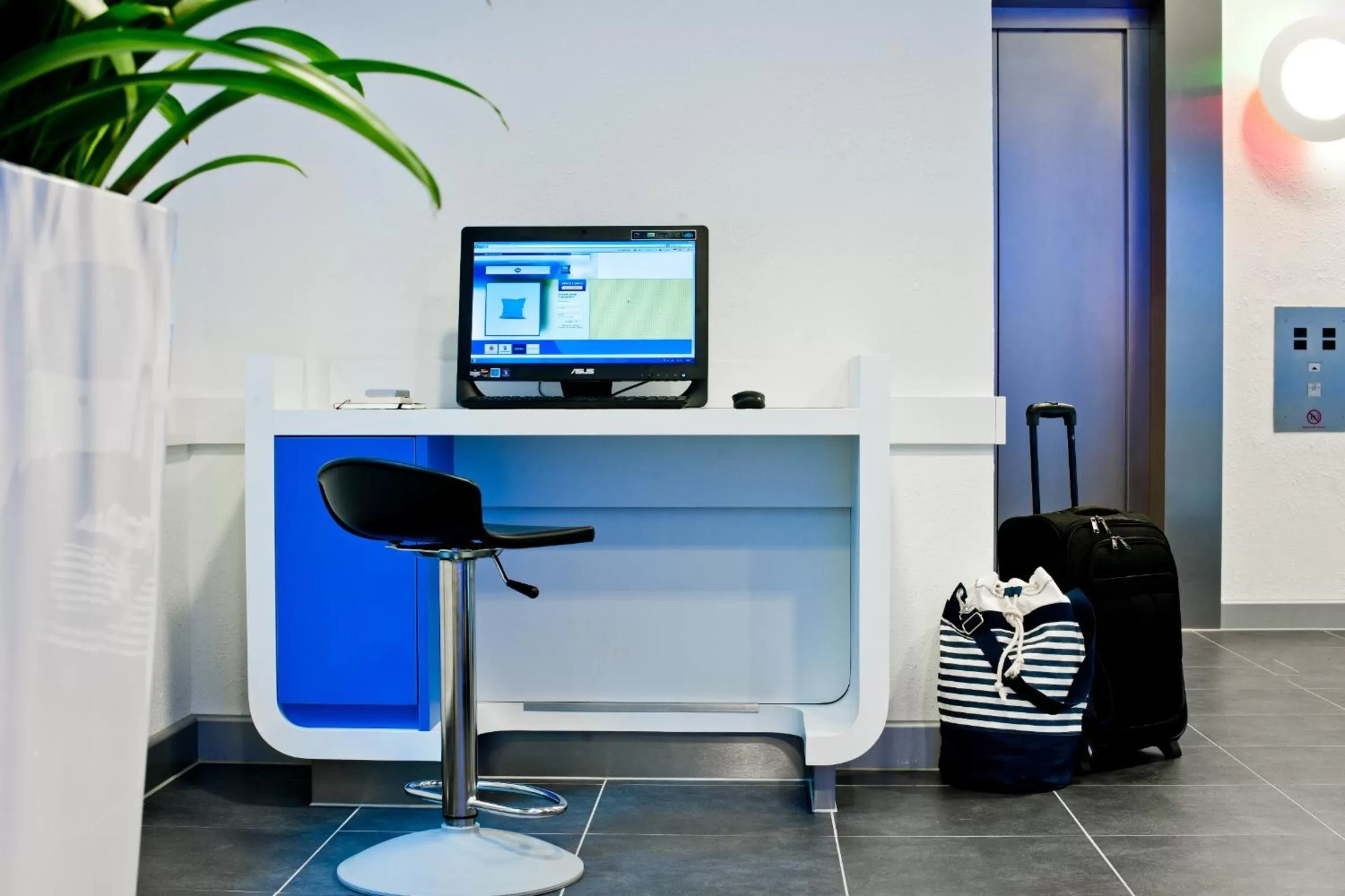 Lobby or reception in ibis budget Ulm City