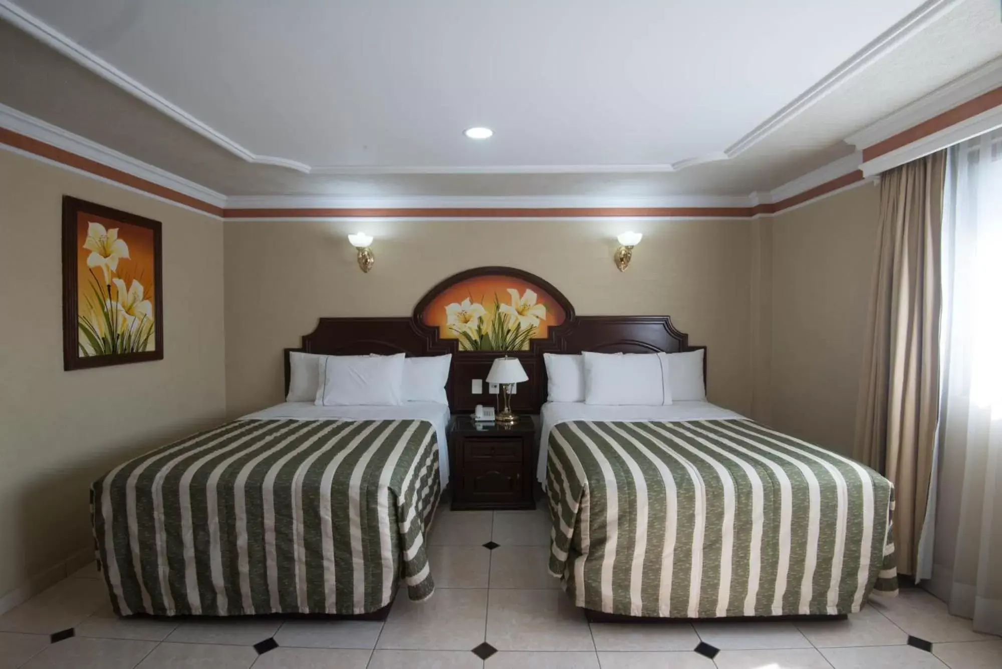 Bed in Hotel Casino Plaza
